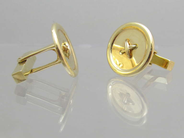 Tiffany & Co. Button style gold cufflinks. 14k gold.

Signed: Tiffany & Co.
