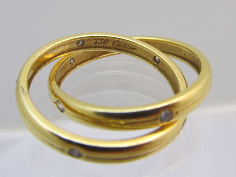 Constellation Trinity Ring!
18k Gold Cartier Double  Band 
10 diamonds 
Size:7.3/4
Signed: Cartier