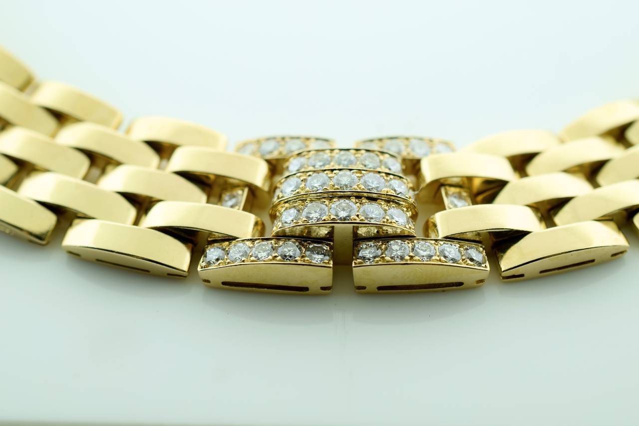 Diamond Panthere Necklace by Cartier 1990's 18 k gold accented  with 123 fine quality brilliant diamonds in 3 segments,
 Estimated total weight of diamonds is 6.25 carats
Makers signature:  Cartier /18k gold