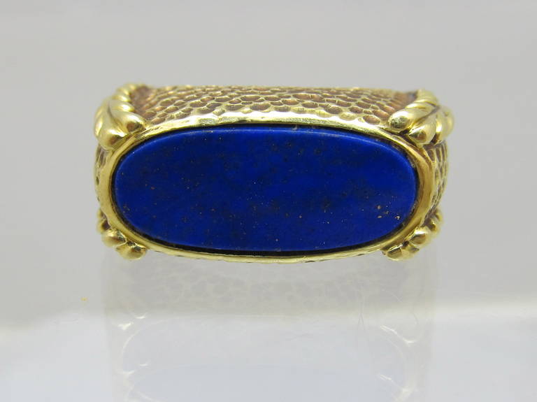 Van Cleef & Arpels Blue Lapis Lazuli Man's Ring,
Beautiful oval shape Lapis Lazuli set in 18k hammered style gold.
Ring size is 8.75 ( it can be resized)
Makers signature: V.C.A. 38154