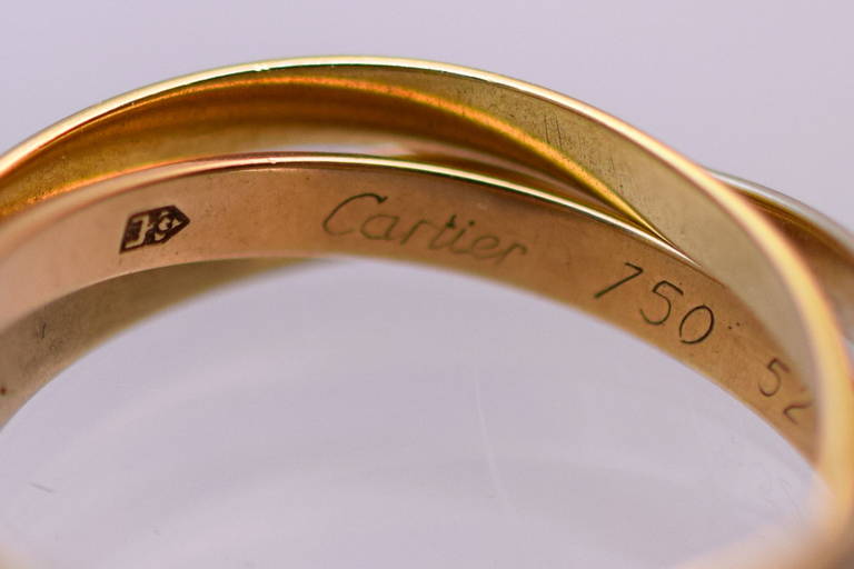 Cartier Trinity Tri-Color Gold Band
18k yellow, white & rose gold 
Signed: Cartier 750 52
Size 7