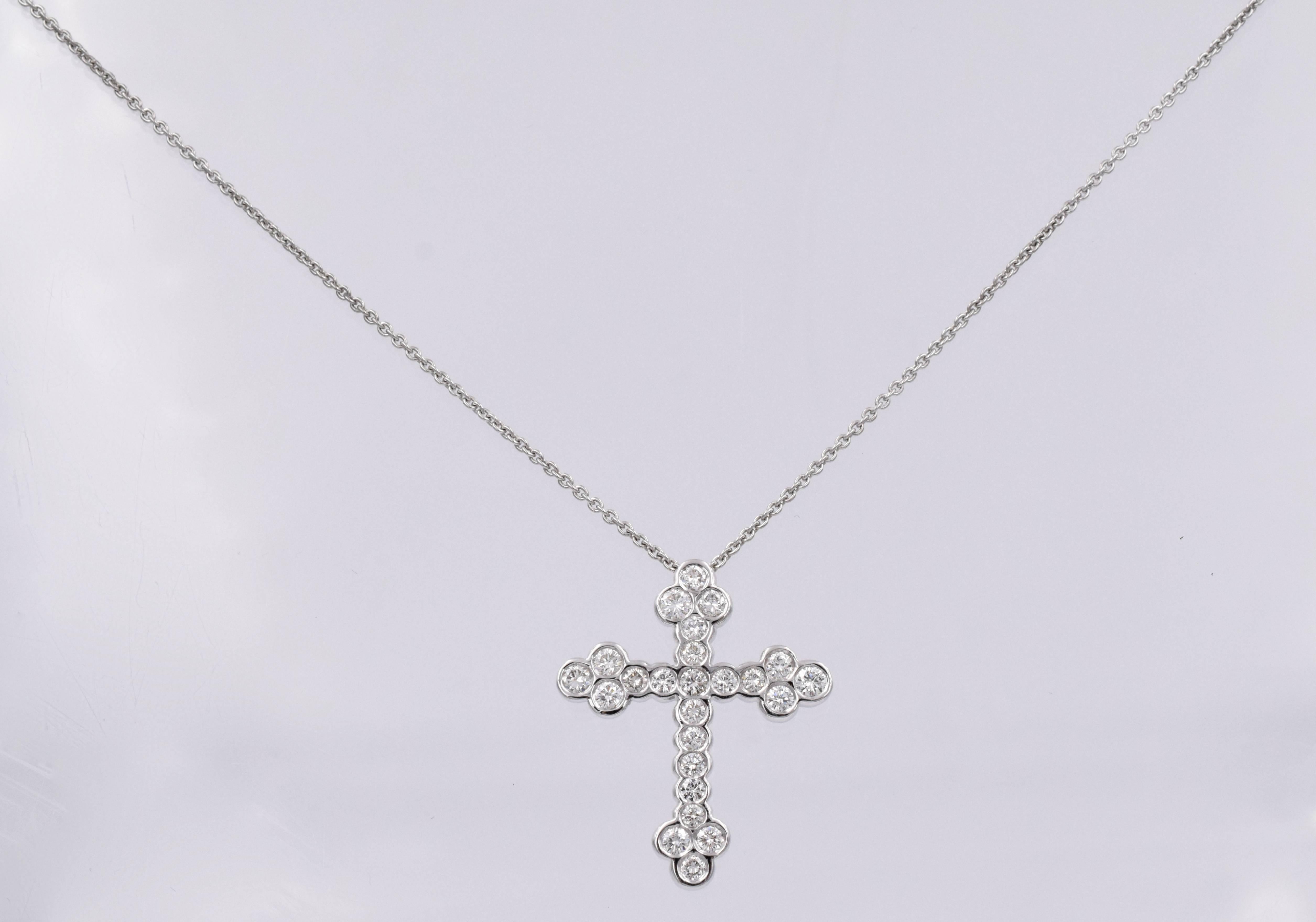 Diamond cross with24 brilliant diamonds set in 18k white gold.  with total weight of 1.8 carats, fine color & clarity diamonds (G-VS)
20 inch long chain with lobster clasp