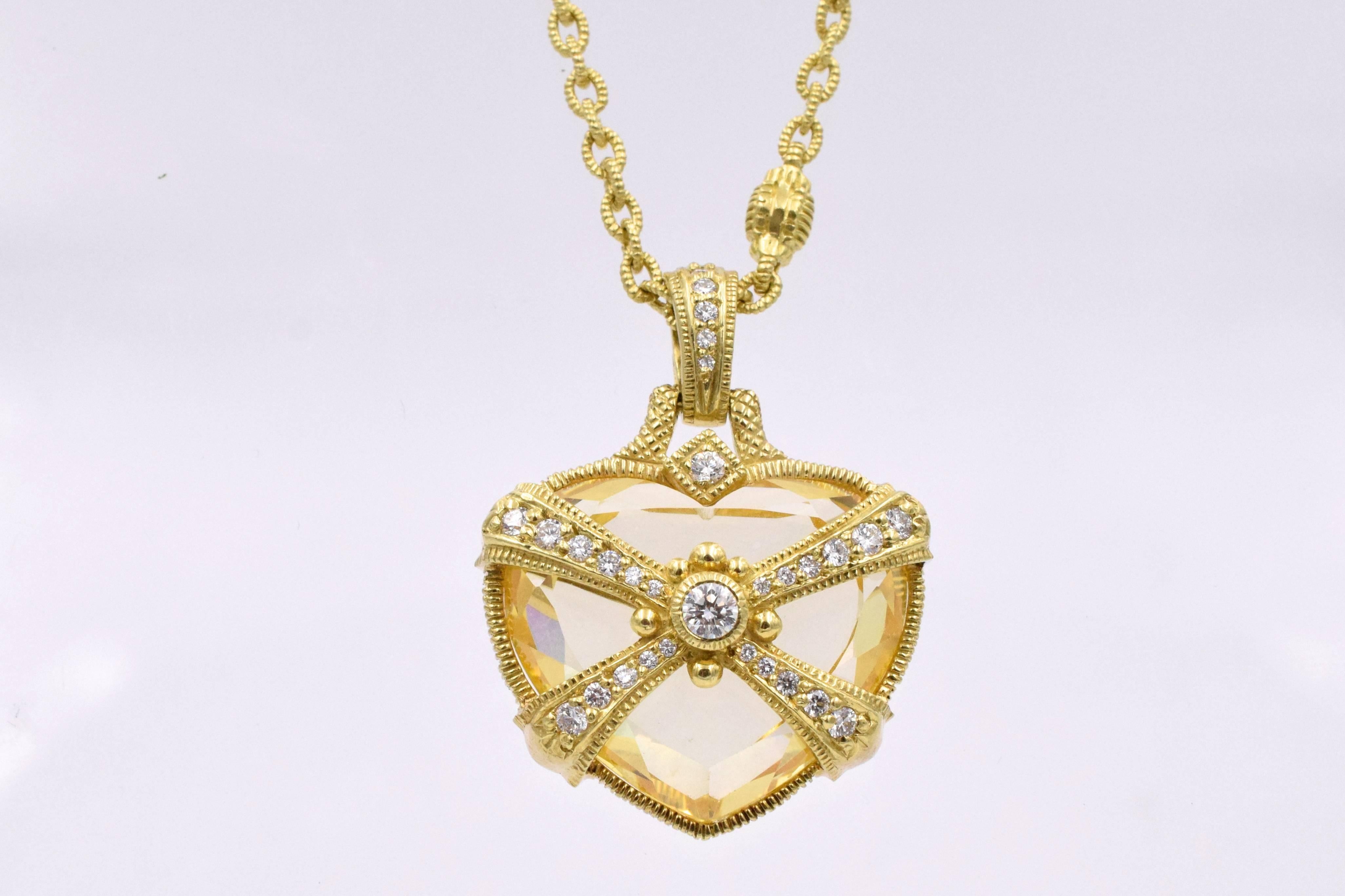 Beautiful 10 carats heart shape citrine accented with 30 brilliant shape diamonds (0.75 carats) suspended from 32 inches long gold link chain.
Gold weight is 30.6 dwt

