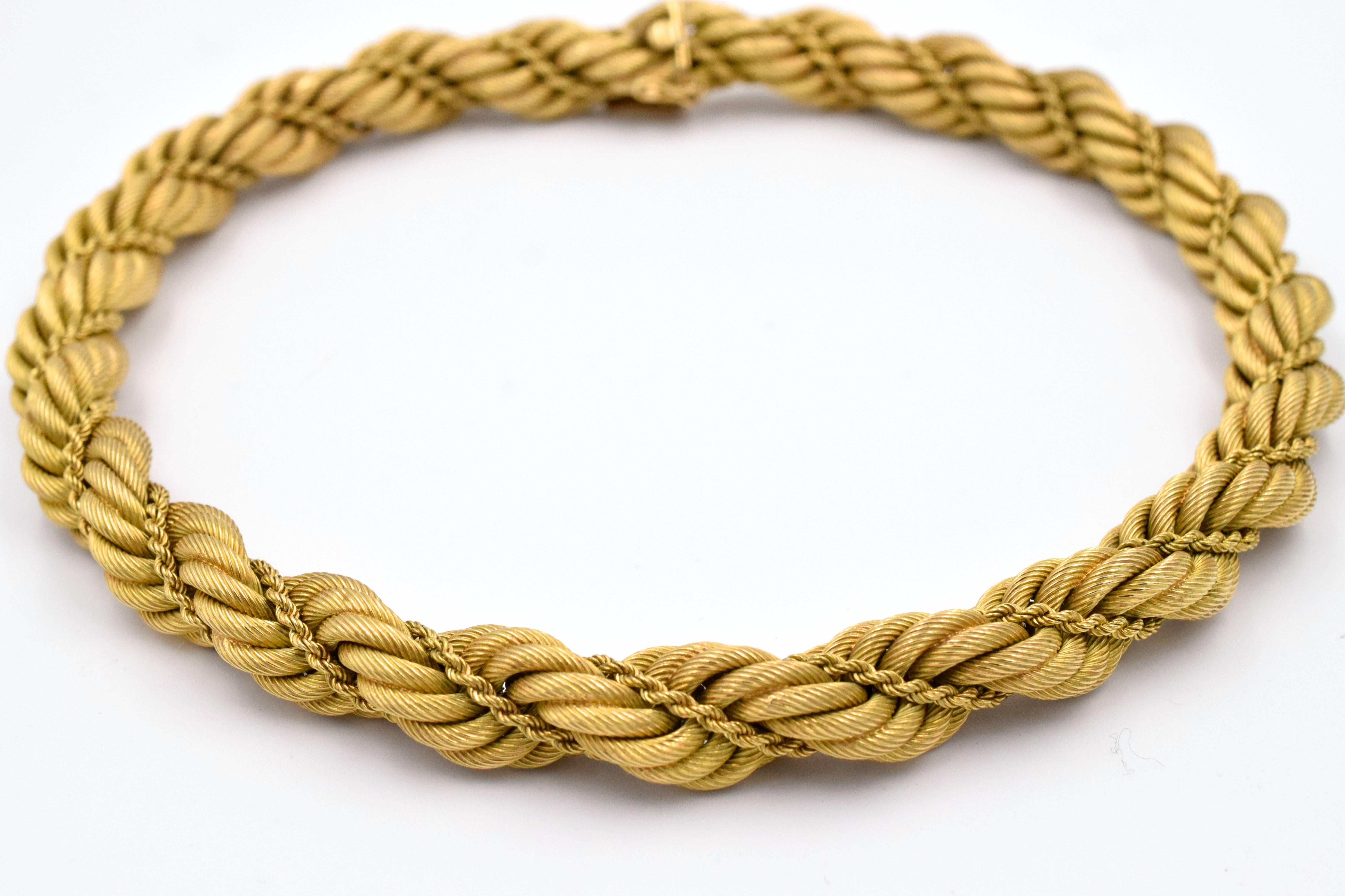 Tiffany & Co. 18k yellow gold necklace with interwoven spiraled rope texture design. The width of the necklace is 12.3mm & 16.5