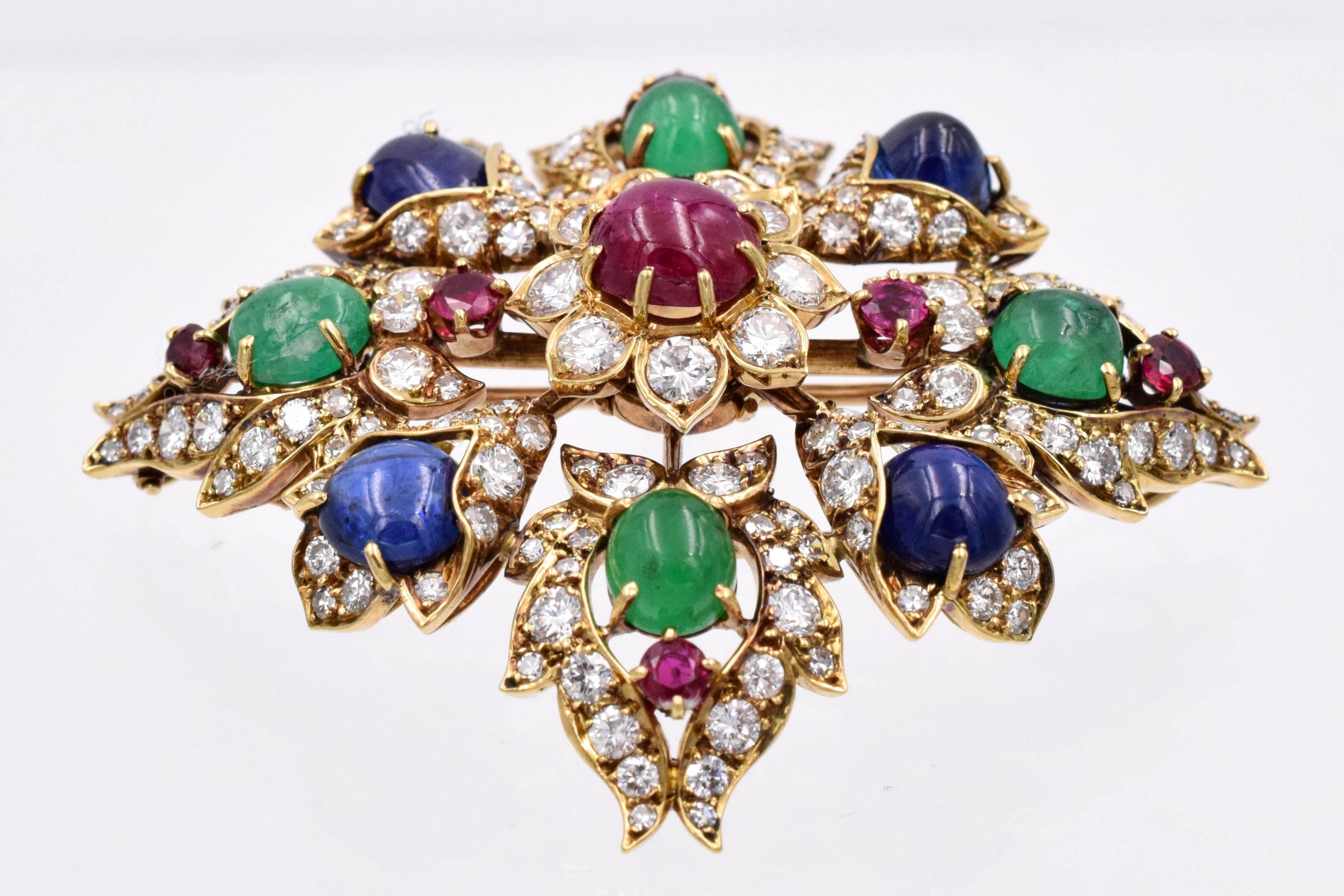 Classic Vintage  Van Cleef & Arpels Diamond, ruby, sapphire & emerald brooch/pendant. Spectacular colorful brooch with 3.32 carats of diamonds, rubies are 4.5 carats, sapphires are 7.5 carats & emeralds are 4 carats.
18k gold Makers' signature VCA &