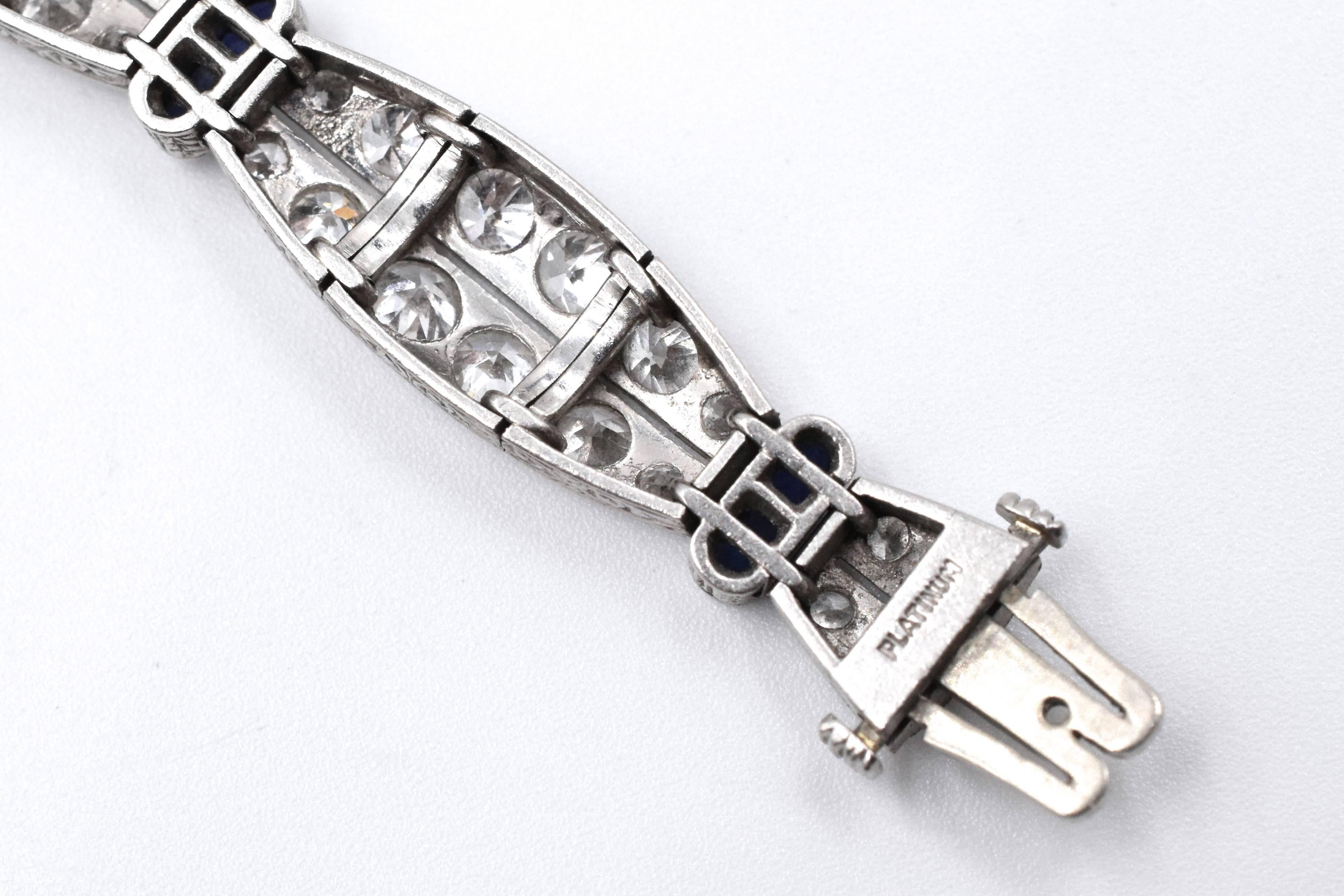 1930s Art Deco diamond and sapphire bracelet,  with 8 diamond sections with sapphire sections in between, set with 96 graduating gold European cut diamonds with approximate total weight of 10 carats and 16 french cut sapphires with approximate