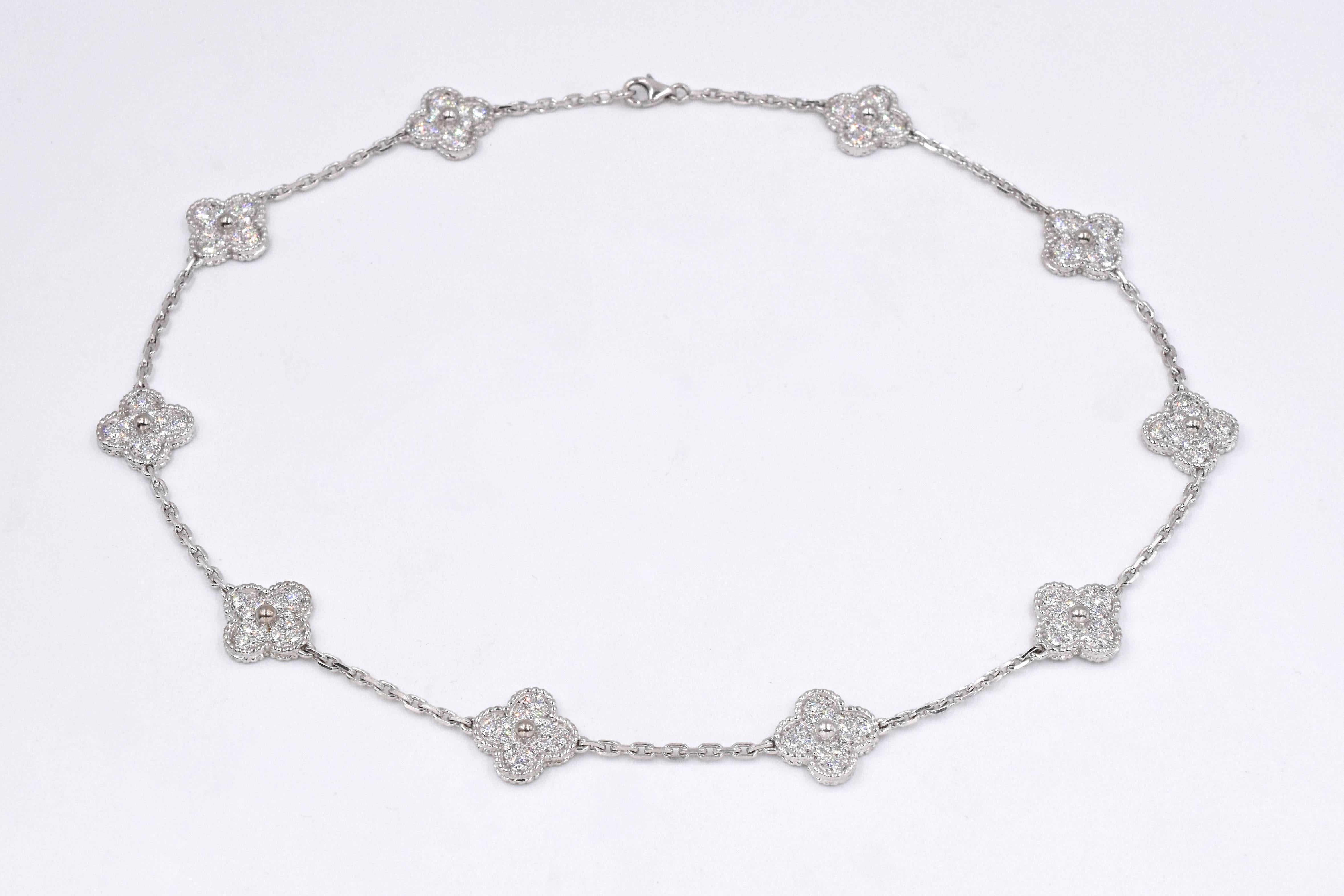 Vintage  V.C.A. Alhambra Diamond Necklace with  10 motif 
Signed V.C.A. stamped 750, and No. BL169460. Length 16” 
( The necklace retails for $53.500 plus tax)

Vintage V.C.A .Alhambra Diamond Earrings with 24 diamonds 
measurements  20mm x