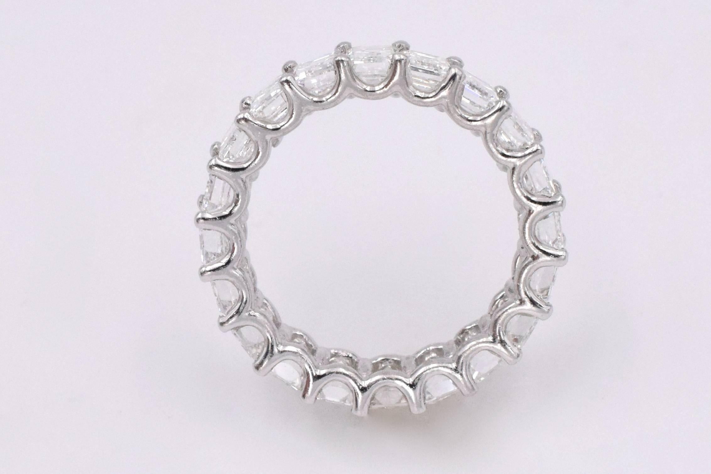 Contemporary Nally Jewels 5.40 Carat Emerald Cut Diamonds Platinum Eternity Band Ring For Sale