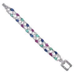 Platine, saphir rubis sculpté  Émeraude  Bracelet avec diamants