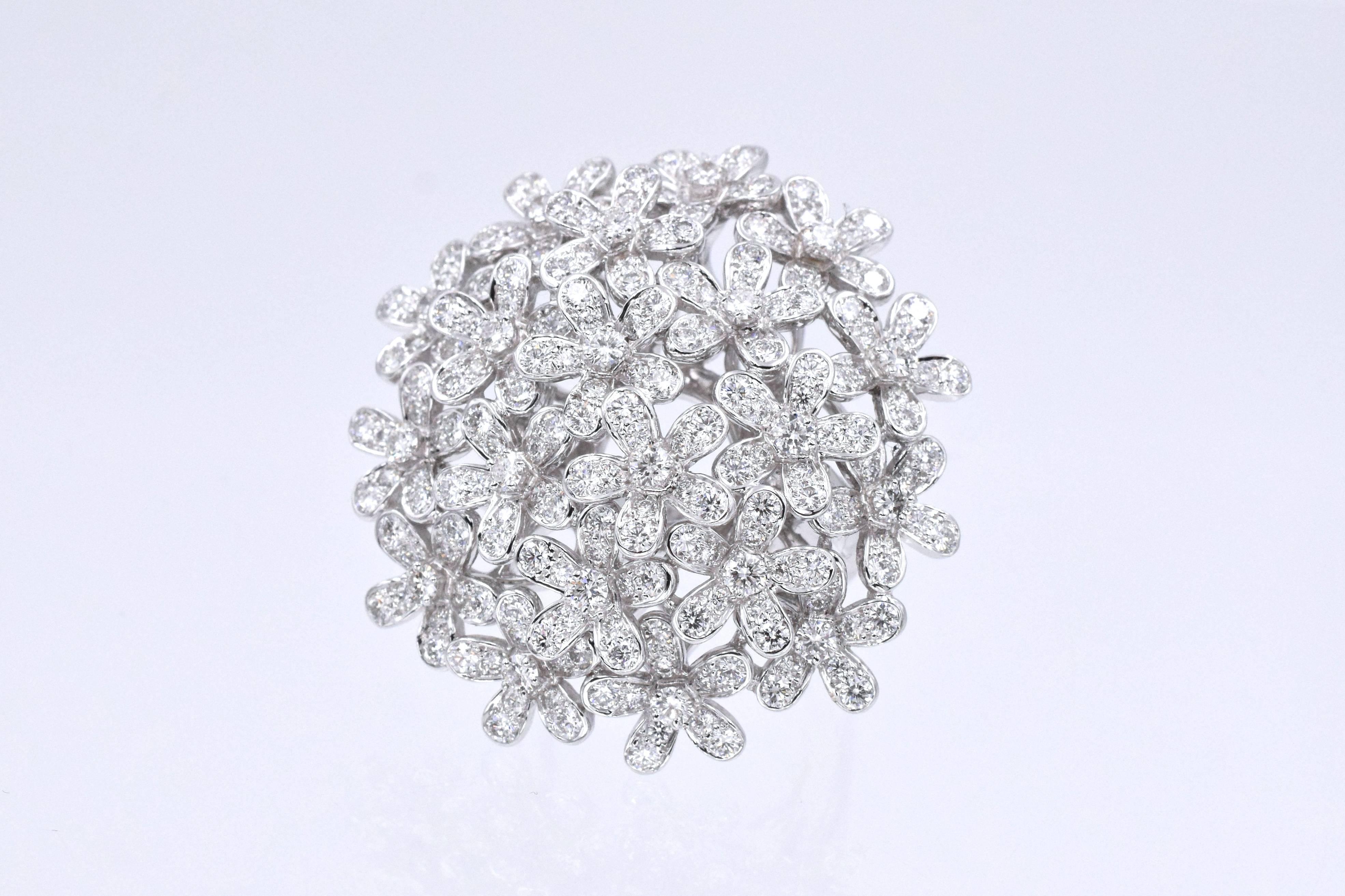 Van Cleef and Arpels 'Socrate Bouquet' Diamond Ring
This 18k white gold ring has about 132 round brilliant cut diamonds with a total carat weight of approximately 3ct. 
Signed VCA 750, Serial No. BL236970. 
Ring size 52 (6.25)
(Current retail price