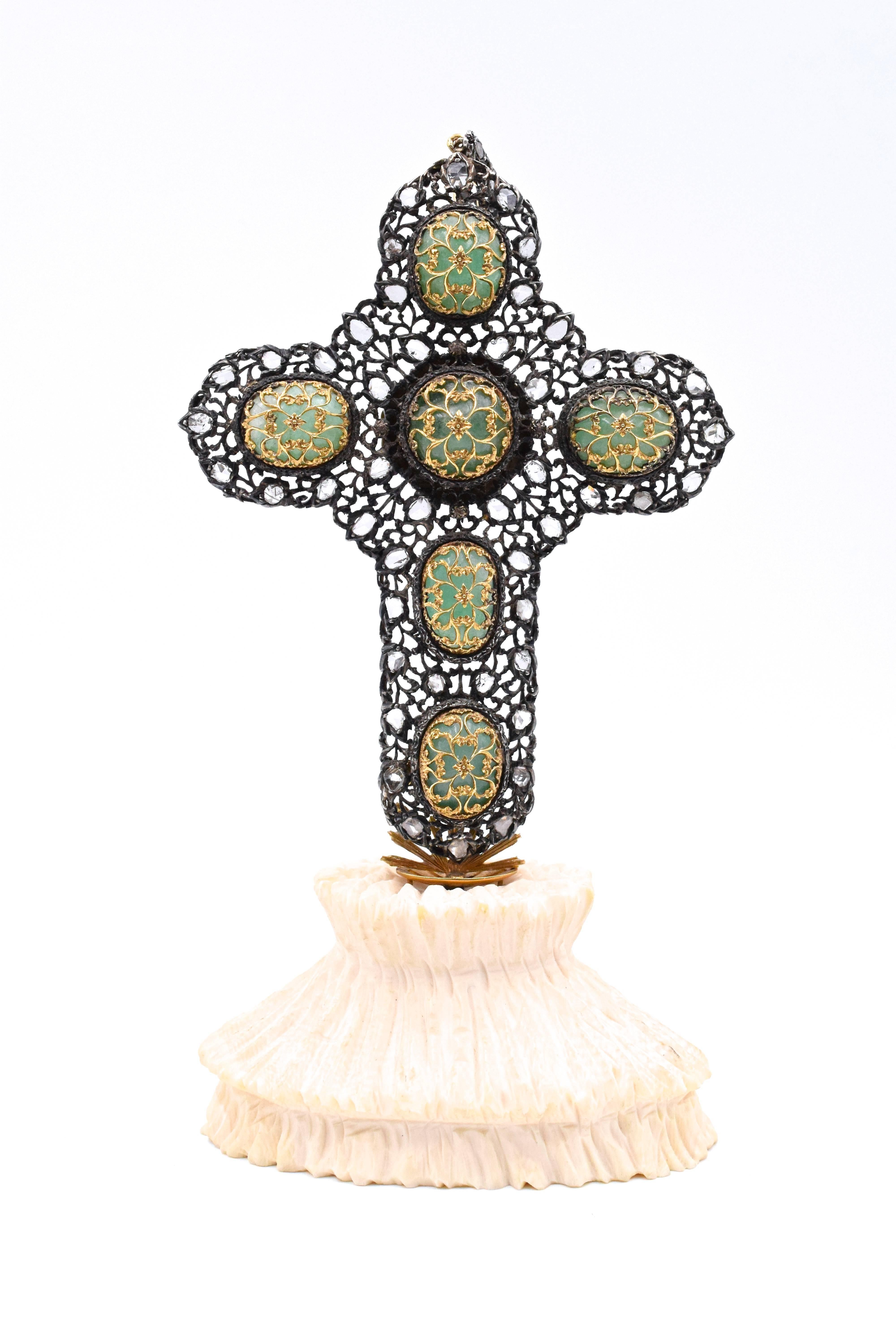 Buccellati Emerald and Diamond Cross. Vintage!
All set in 18k Yellow Gold and Silver, this cross has 6 cabochen shaped emeralds with total carat weight of approximately 50cts and 51 Rose Cut diamonds with a total carat weight of approximately 4.08