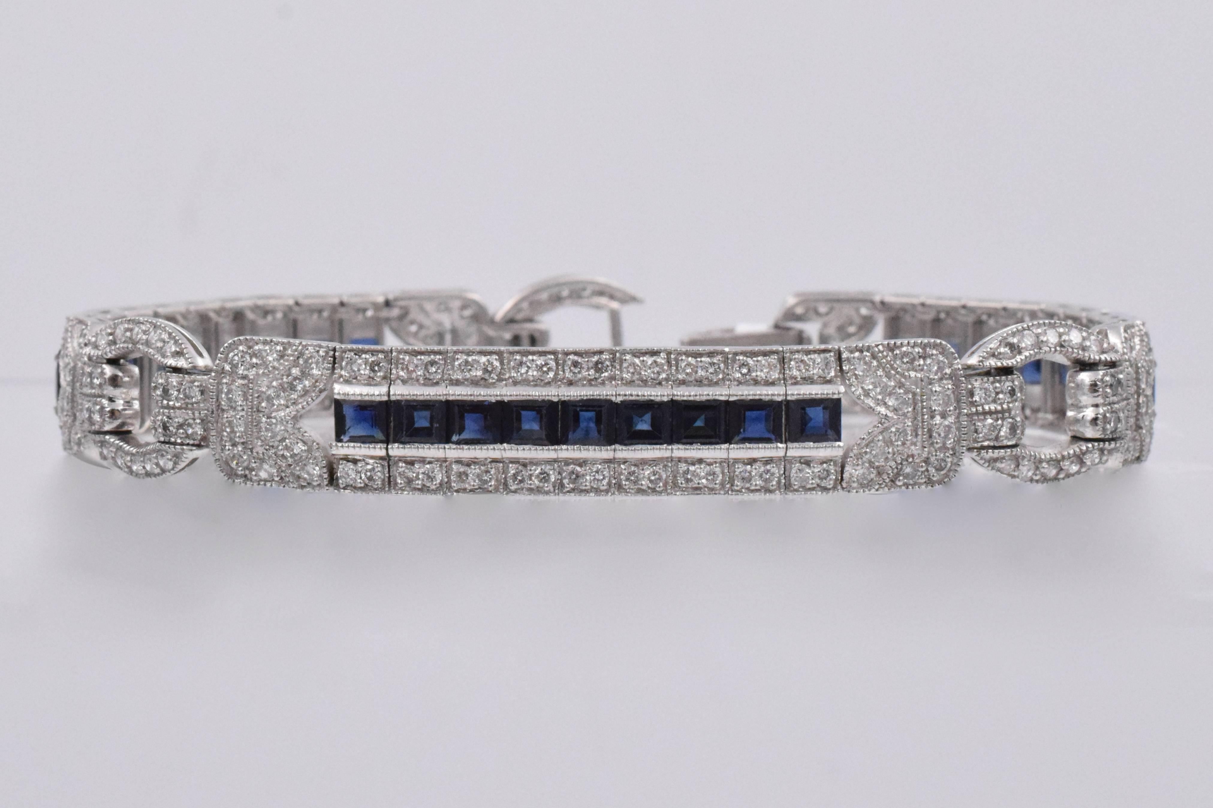 Cl;aspic three sectional sapphire and diamond  bracelet and diamond bracelet
.each section has channel set french cut sapphires surrounded by pave set brilliant diamonds.
Estimated total sapphire weight is 8.25 carats and diamonds is 3.70