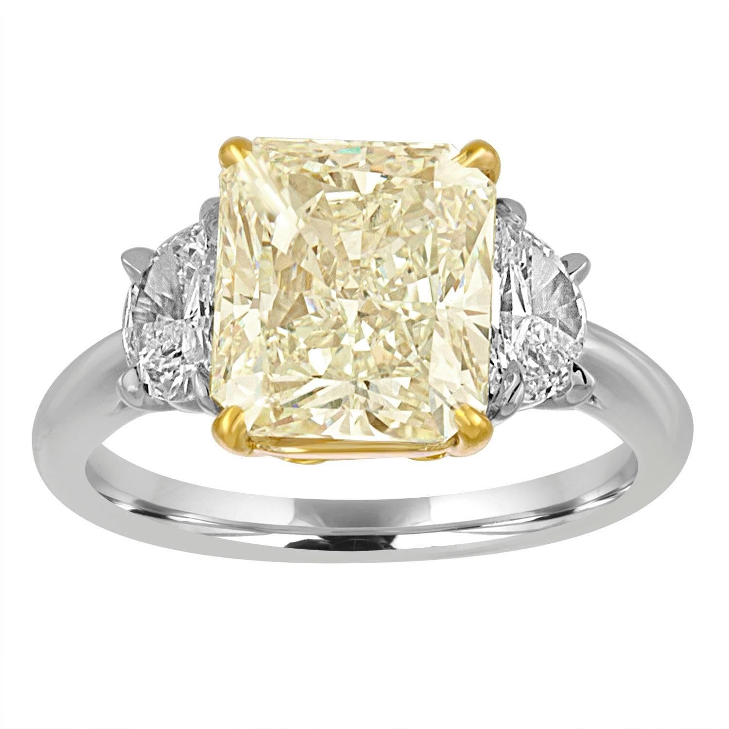4.01 Carat Radiant Diamond Set with Half Moons in Gold and Platinum Mounting