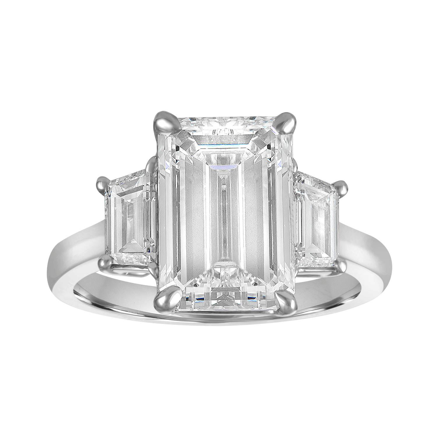 5.01 Carat GIA JVS2 Emerald Cut Diamond set in Platinum with Two Trapezoids