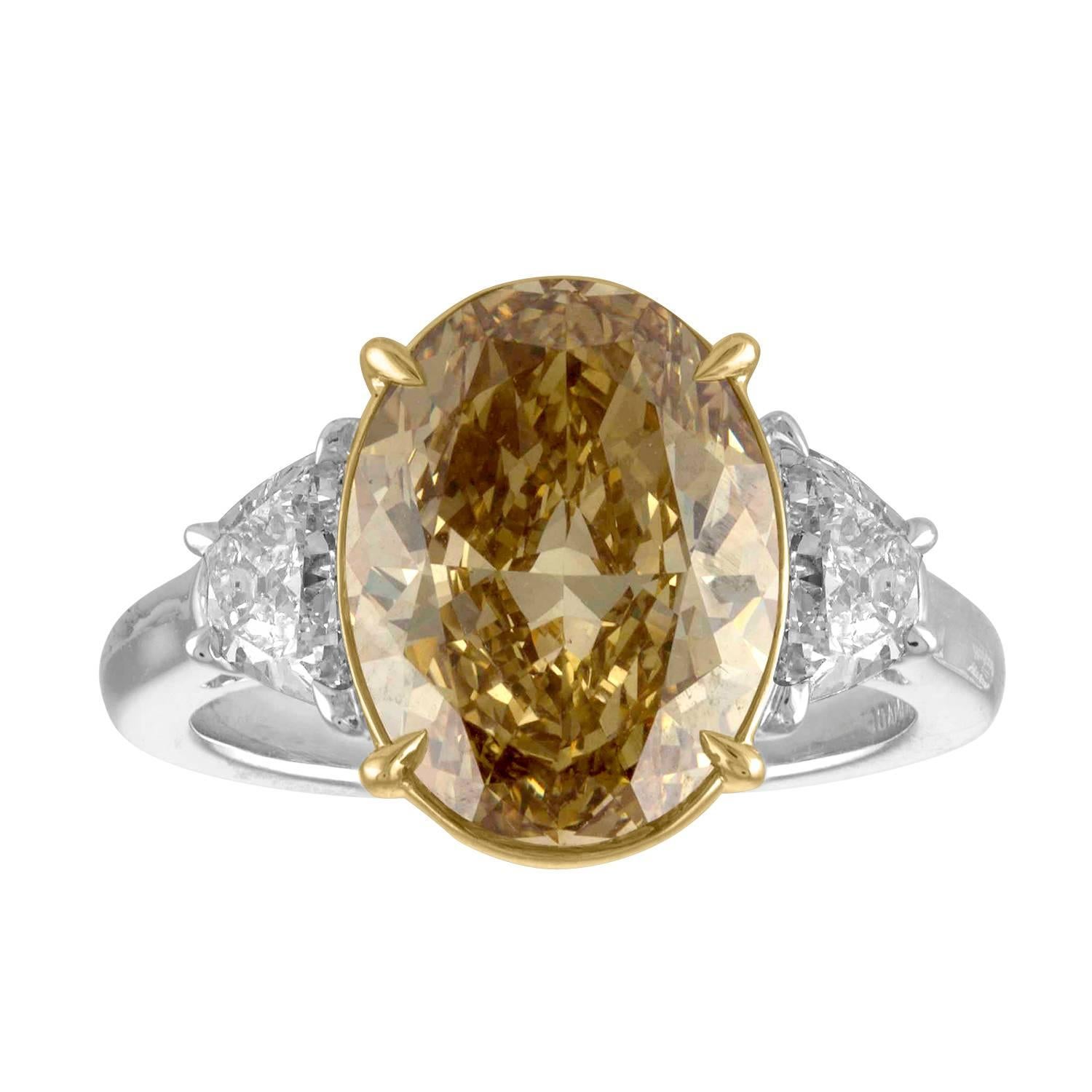 5.05 Carat Oval GIA Certified Set in Two-Tone Three Stones Ring