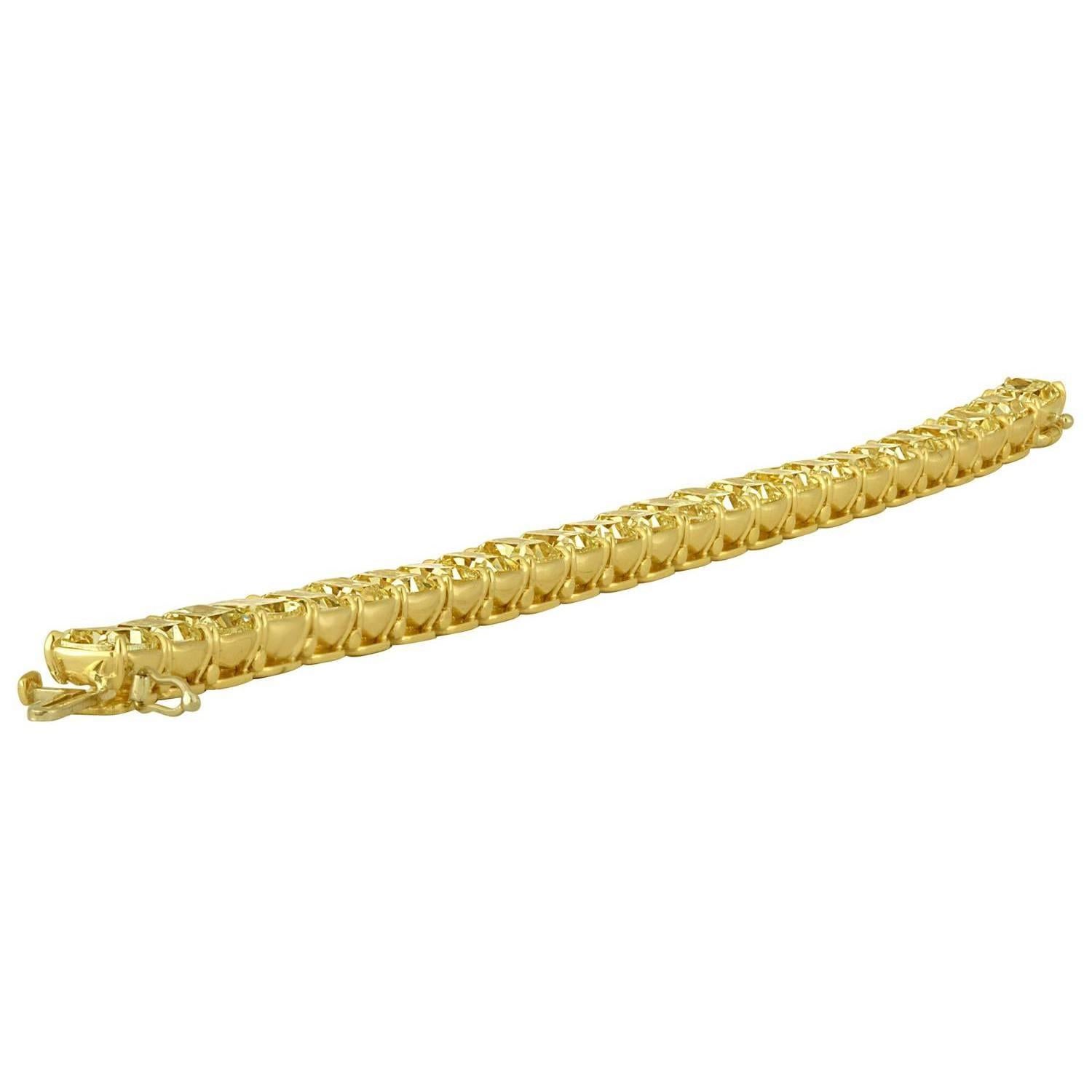 25 Yellow Diamonds Cushion Cut weighting 38.12 Carat Total Weight are set in Hand Made 18K Yellow Bracelet Mounting. The Ultimate setting for a Classical Bracelet that makes a statement by itself. The Diamonds are Not Certified, however they are