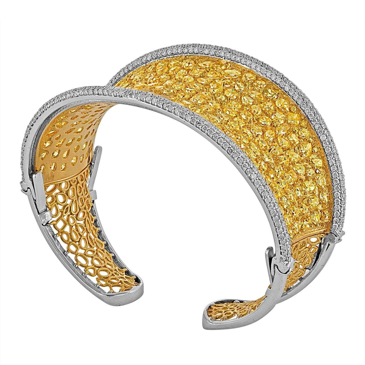 Fancy Shaped Yellow and White Diamonds set in Two Color Gold Bangle Bracelet
