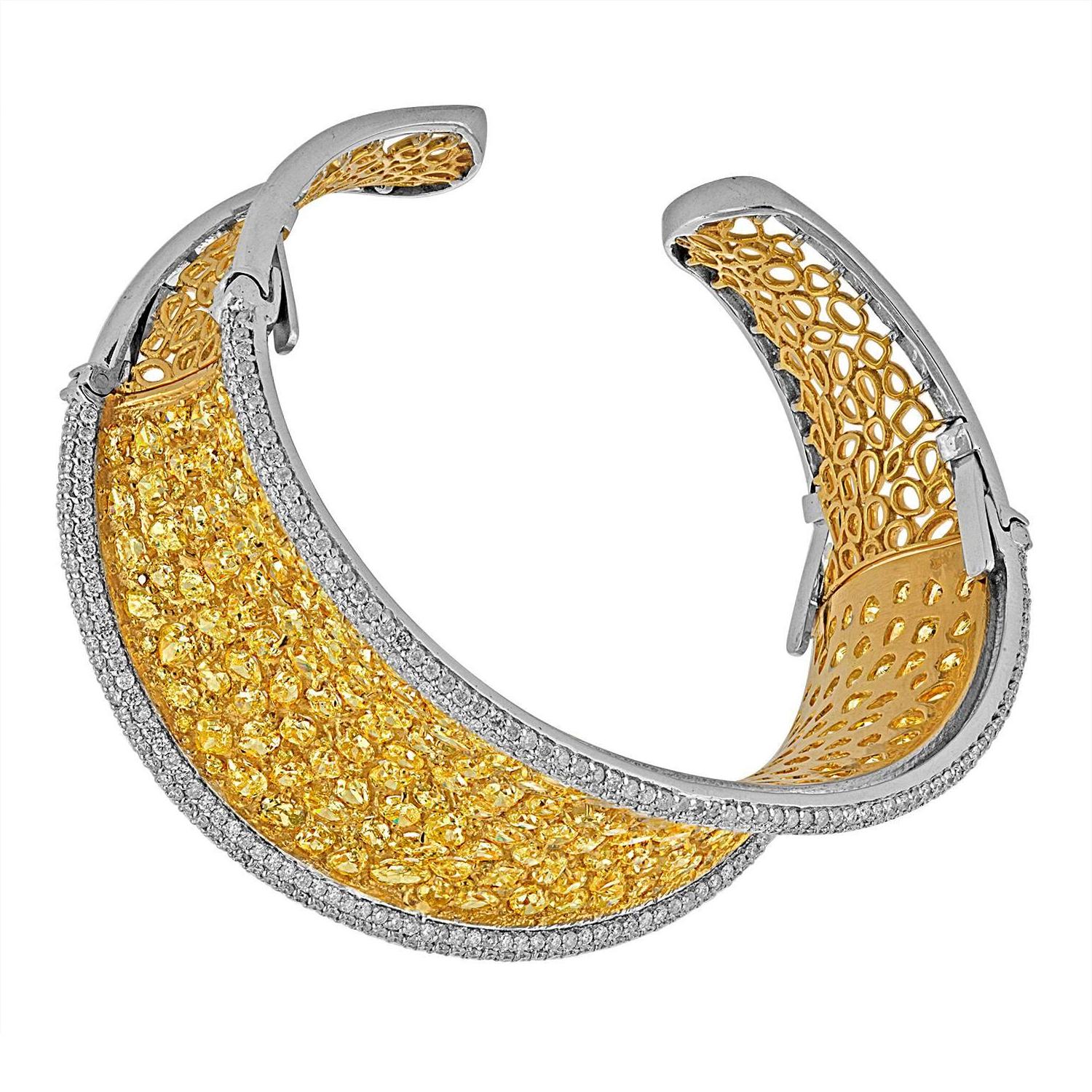 Contemporary Fancy Shaped Yellow and White Diamonds set in Two Color Gold Bangle Bracelet