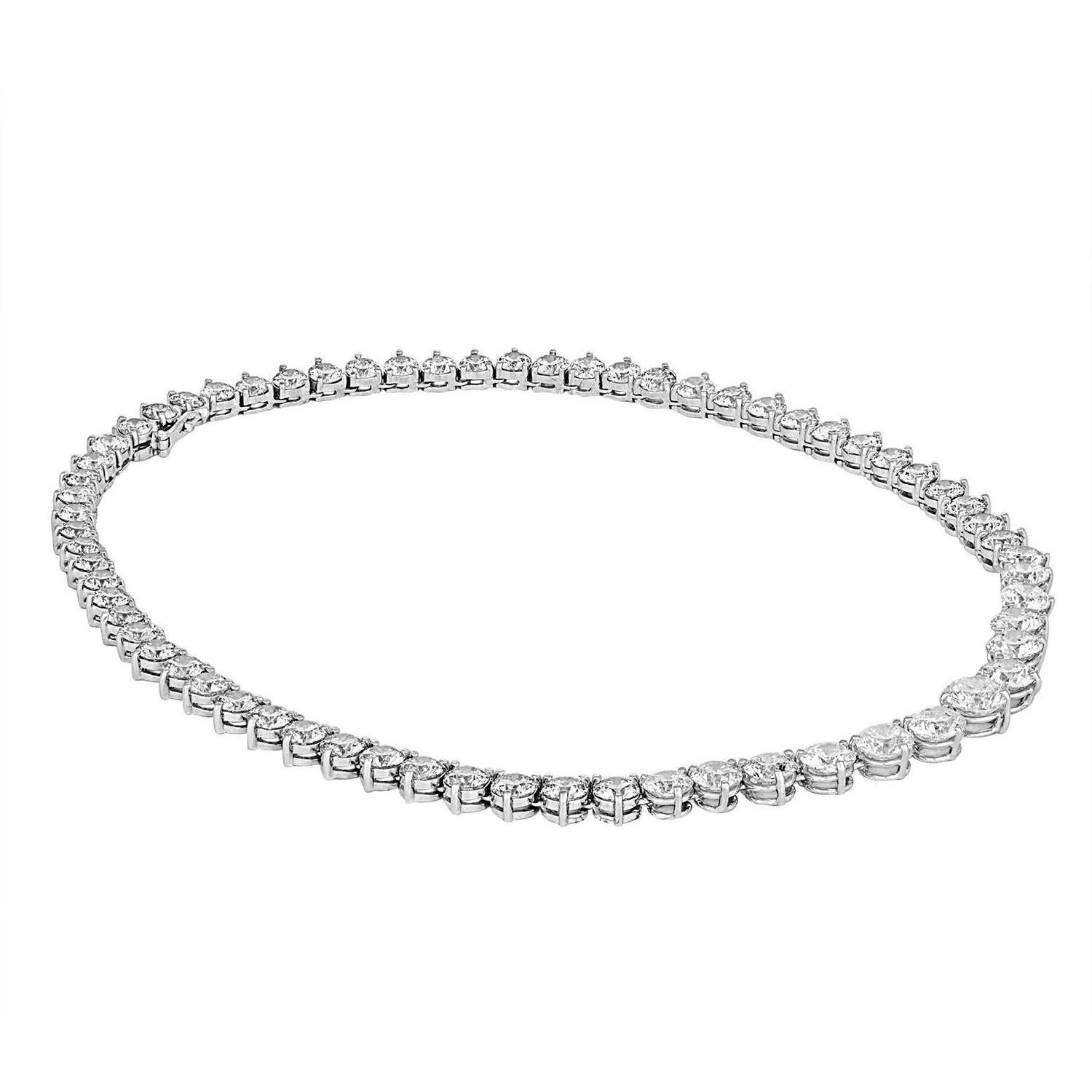 Graduating 66 Brilliant Diamonds, 49.63 CT TWT, are set in White Gold Tennis Necklace Mounting. Center is 8.5 MM which is over 2 Carats Diamond. The smallest stone is 5.5 MM, which is approximate 0.60-0.65 Carat. This Amazing Necklace is 16