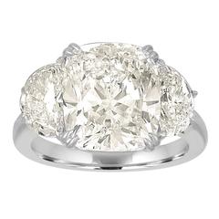 7.06 Carat Cushion Cut Diamond Set with Half Moons in Platinum Ring Mounting