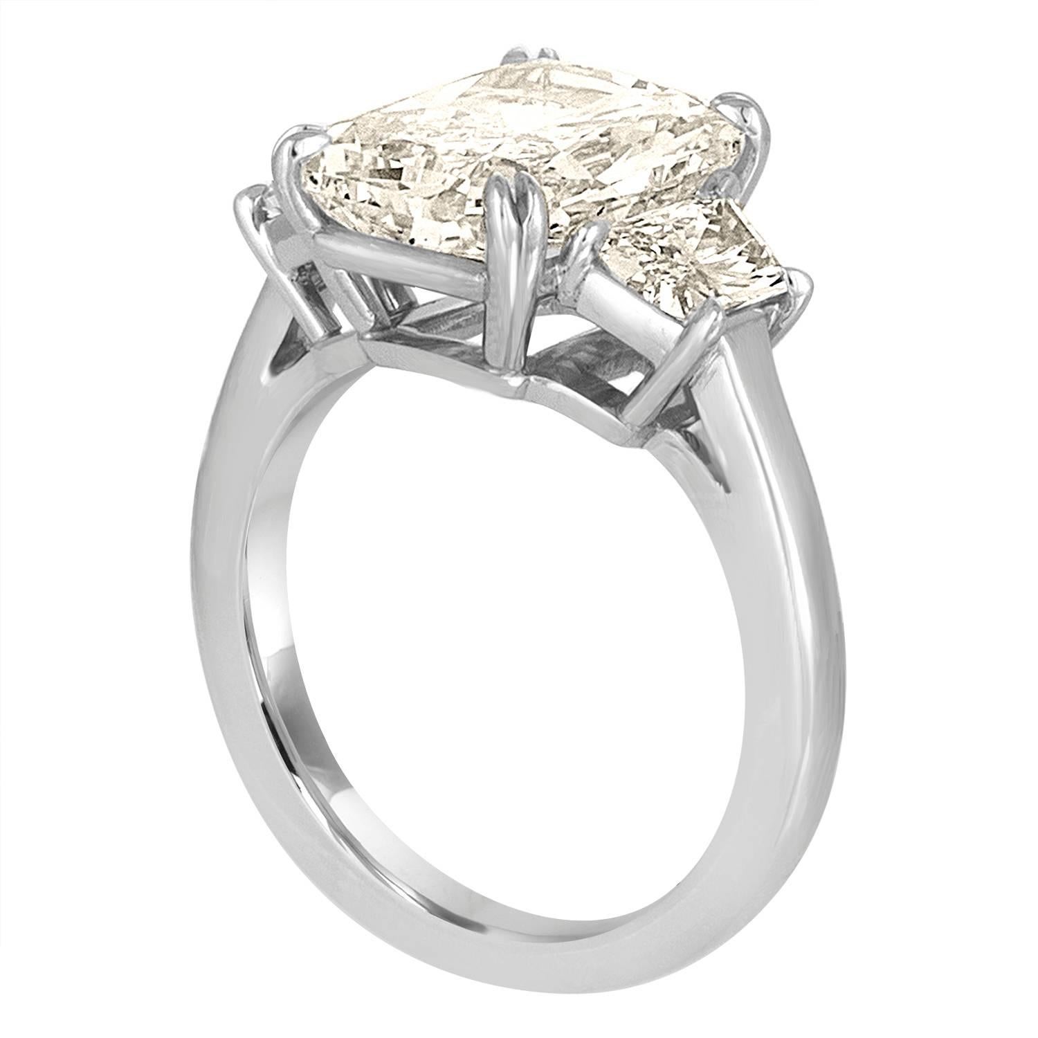Women's 5.12 Carat GIA Cert Radiant Cut Diamond with Two Trapezoids in Platinum Ring