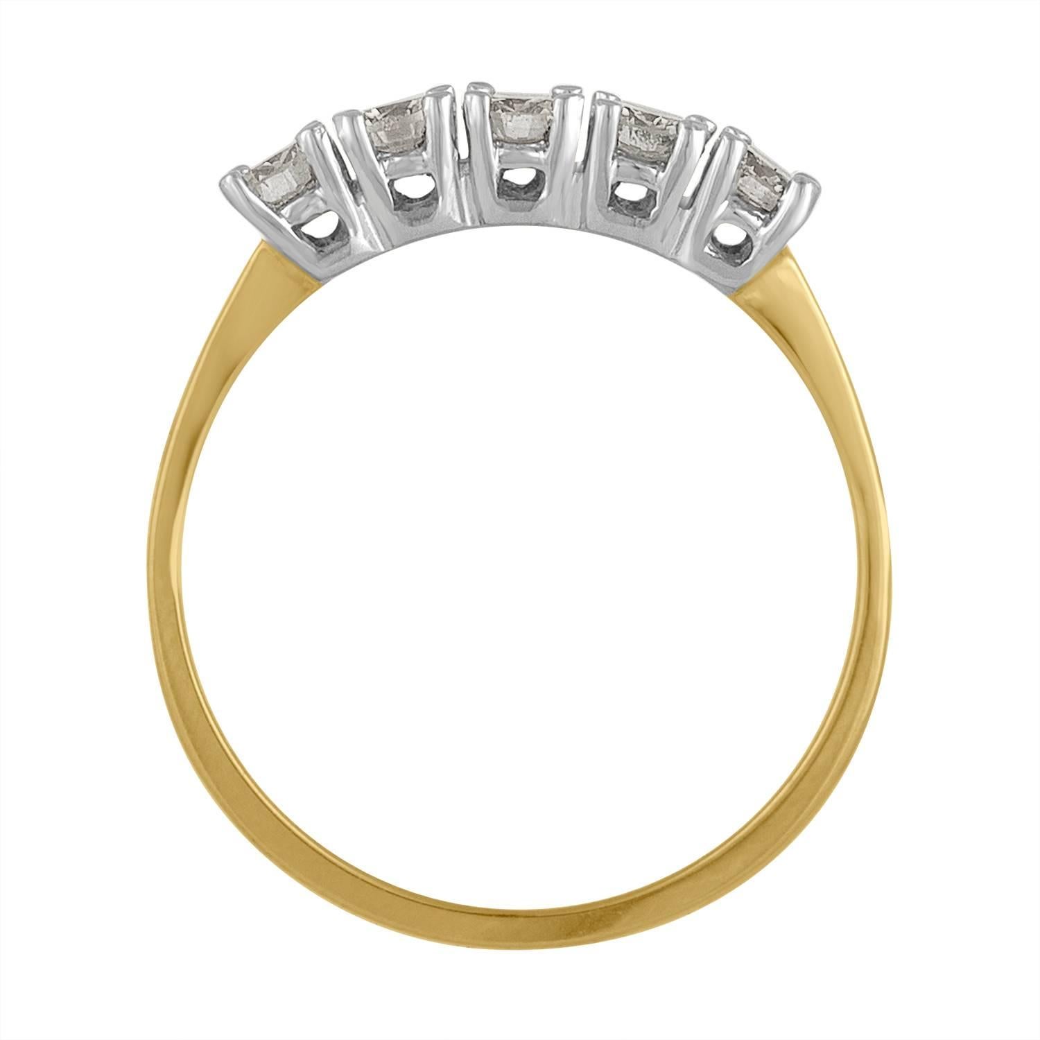 Classic Two Tone Diamonds Wedding Band with Five Diamonds Weight 0.50 Carat Total Weight.

Beautiful, Shiny and Sparkly Diamonds Estimated to be G in Color and VS in Clarity. 

The Band is 14 karat Yellow Gold, and the Diamonds are set in 14