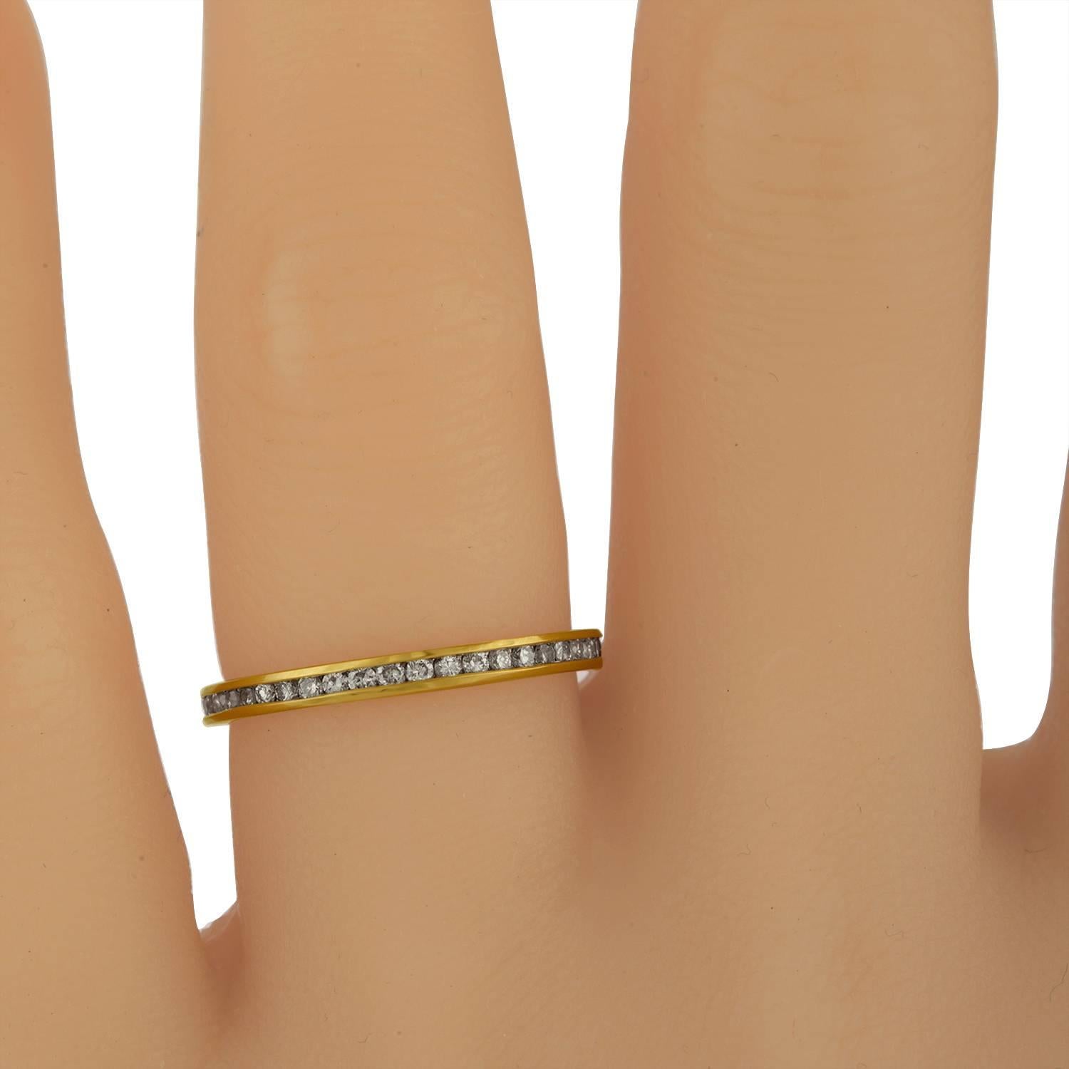 Yellow Gold Wedding band with 0.75 Carat Total Weight of Diamonds set all around in Basel Set Style.
The Diamonds are Shining through the Yellow Gold Wedding Band Estimated to be G in Color and VS in Clarity.
The ring is size 6.