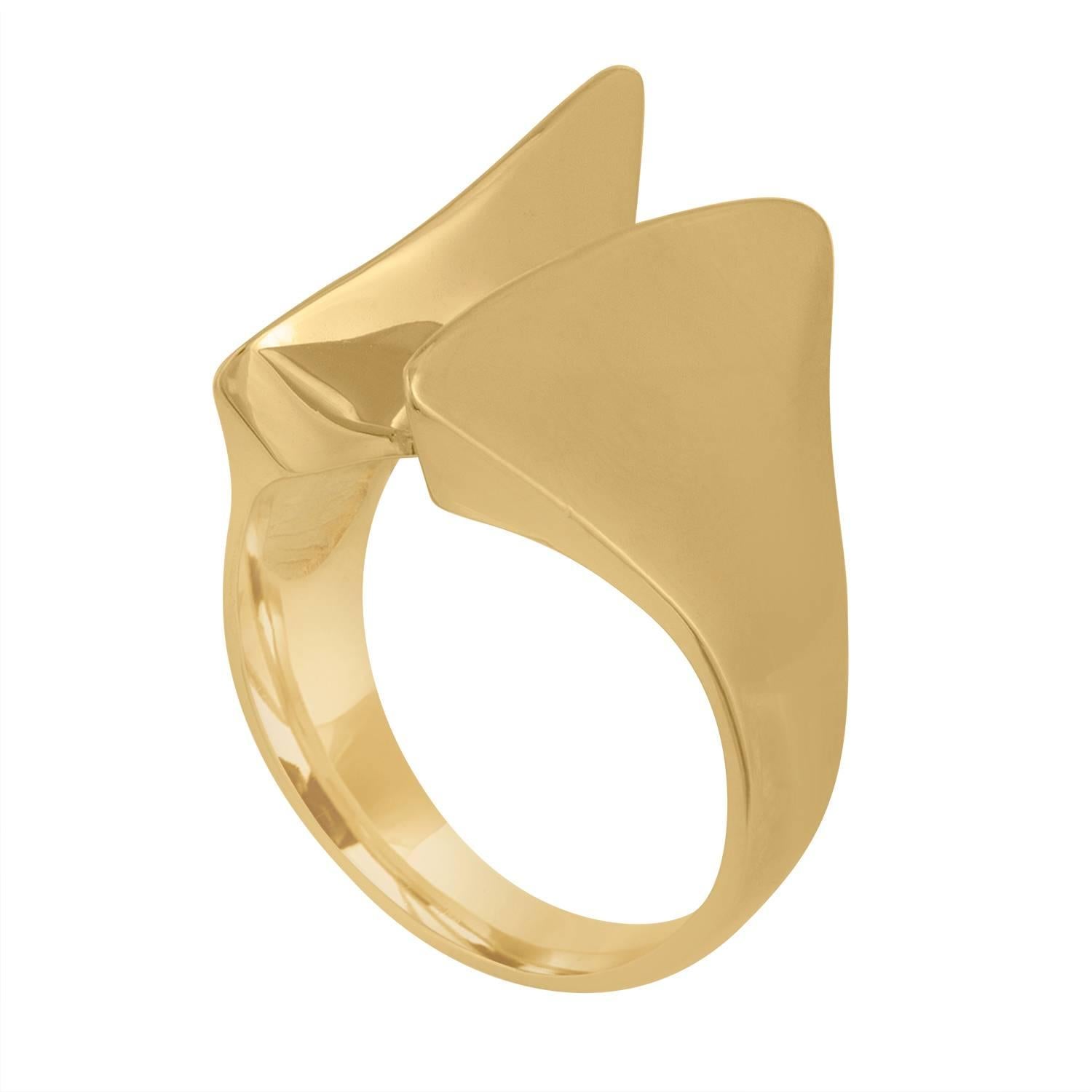 8.62 Grams of Yellow Gold Ring. The ring is Fashionable Ring with unique Gold Abstract Design. The Ring is size 5 3/4.