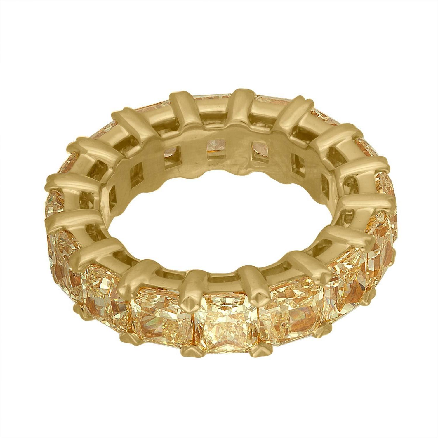 16 Matching Radiant Cut Yellow Diamonds are Set in 18 Karat Yellow Gold Eternity Band.
Each Diamond is Approximately 0.55 Carat. The Total Weight of the 16 Beautiful Diamonds are 8.90 Carats Total Weight.
It is Your Classic Wedding Band, Each