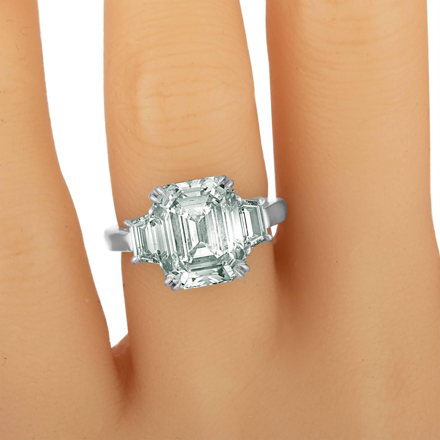 Contemporary 6.02 Carat Emerald Cut Diamond Set in Platinum with Trapezoids