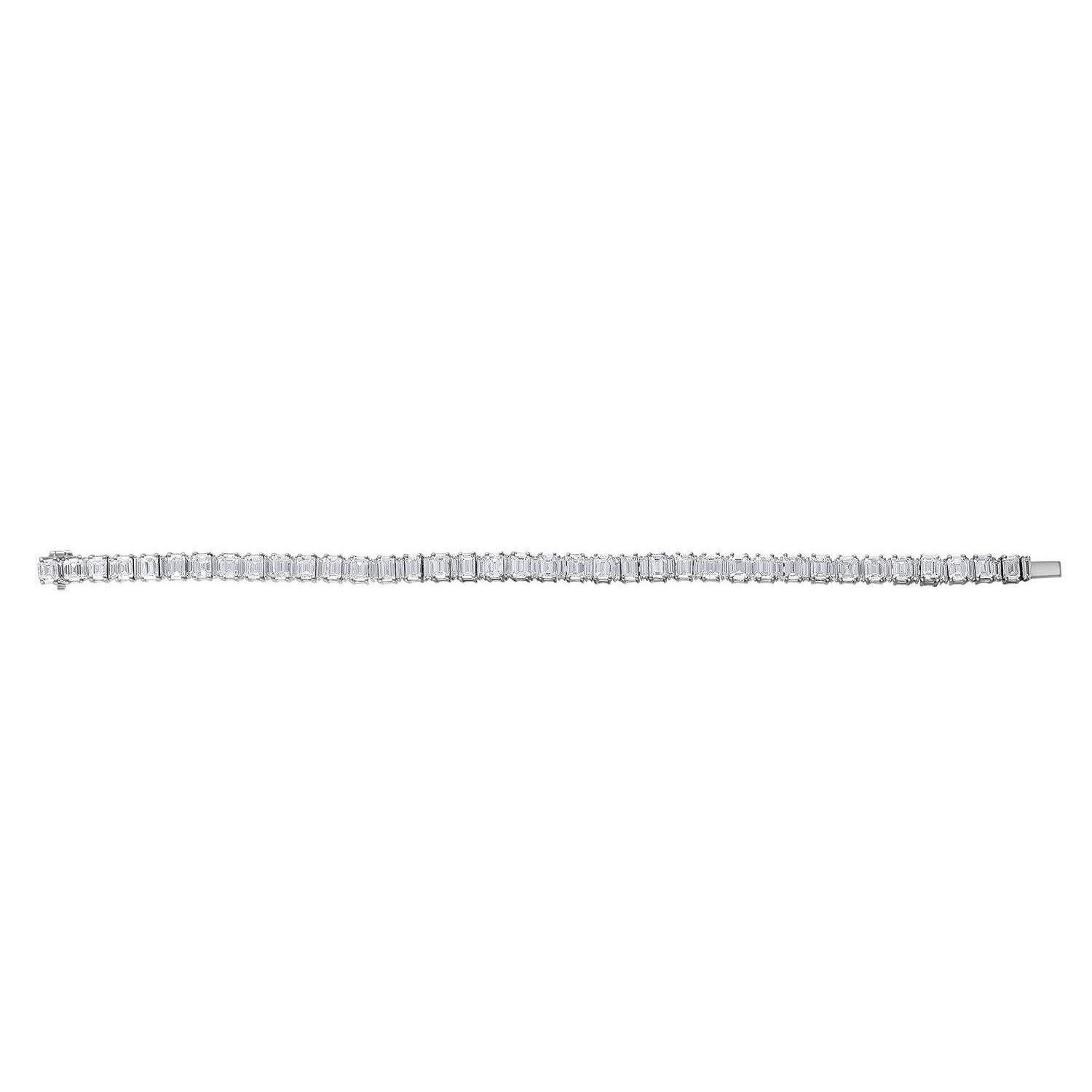 Beautiful Combination of Emerald cut Diamonds and Baguettes set together in a Tennis Bracelet. The Diamonds are alternating and giving the bracelet a unique look.
The Emerald Cut Diamonds are 37 Diamonds and they weigh 12.95 Carats in Total. The 37