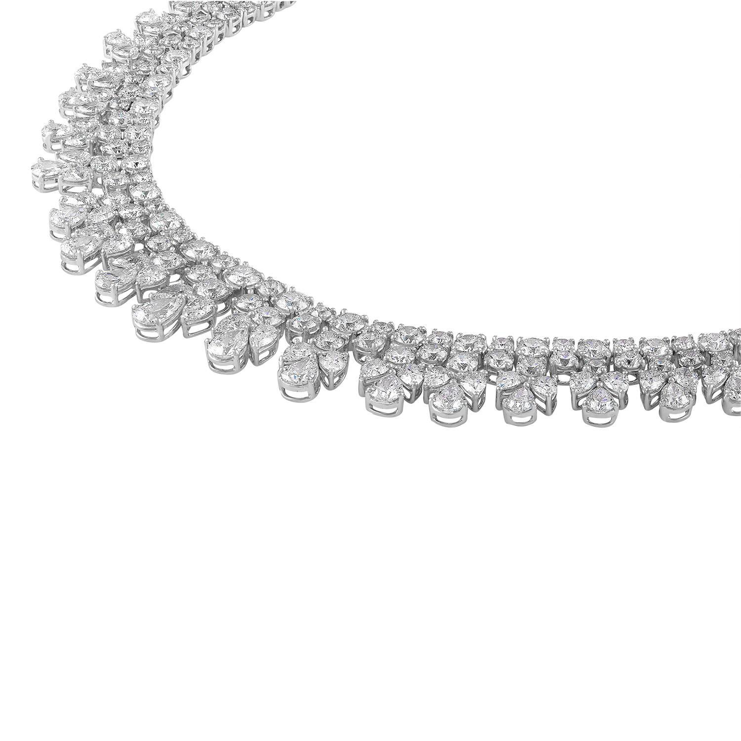 Amazing, one of a kind Diamond Necklace with approximately 50 Carats of 
White Diamonds.
This Necklace, 16.5",  has combined 333 Pear Shapes and Round Brilliants Diamonds all set in Platinum.
The Diamonds are F in color and VS in Clarity.
