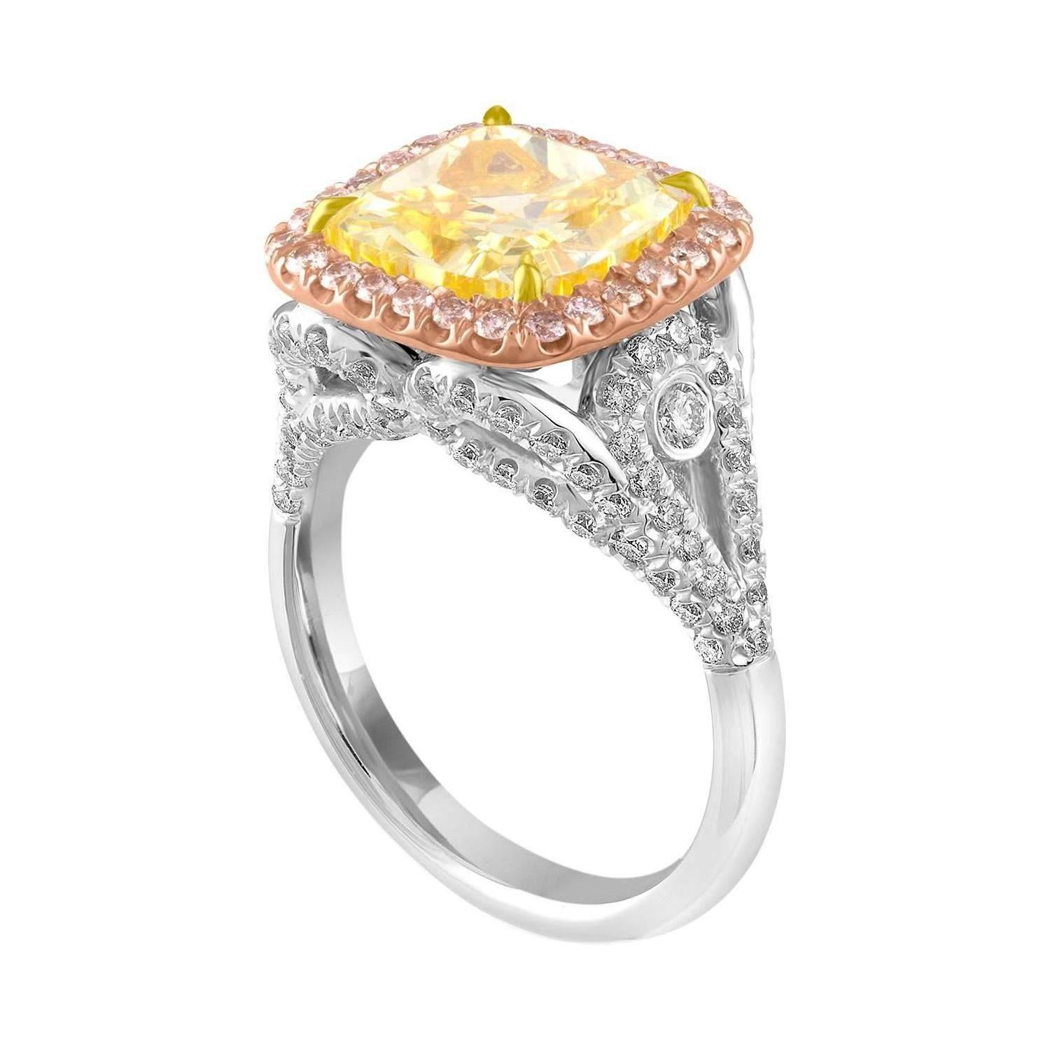 Beautiful Hand Crafted Three Colors Metal combined with Yellow, Pink & White Diamonds Ring. Yellow Diamond set in 18K Yellow Gold, Pink Diamonds are set in 18K Rose Gold and White Diamonds are set in Platinum.
The 5.03 Carat Cushion is a GIA