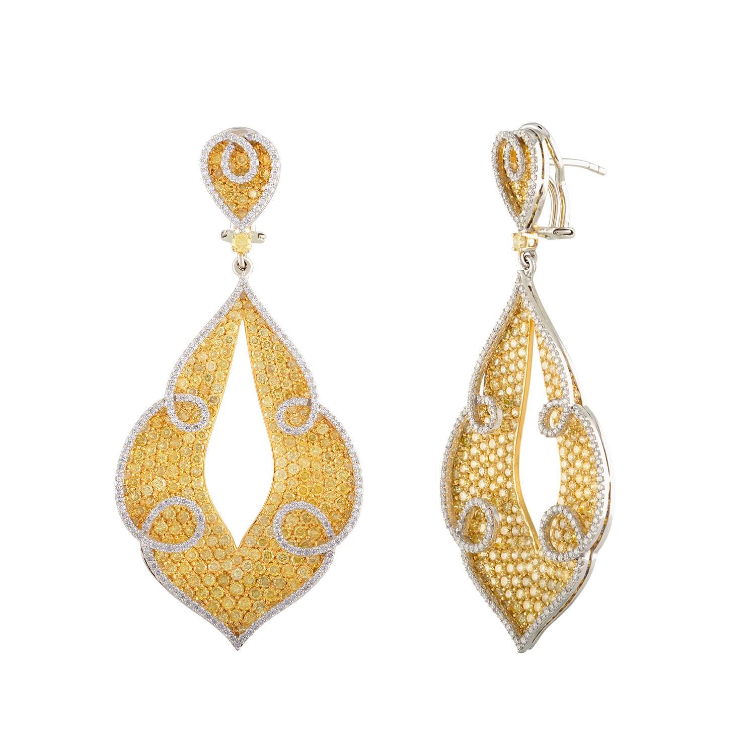 Combination of Two Beautiful Colors - White & Yellow in 18 Karat Yellow Gold & 18 Karat White Gold.
The White Diamonds are set into the White Gold Metal and the Yellow Diamonds are set into the Yellow Gold Metal.
This Dangling Earrings are 2 1/2