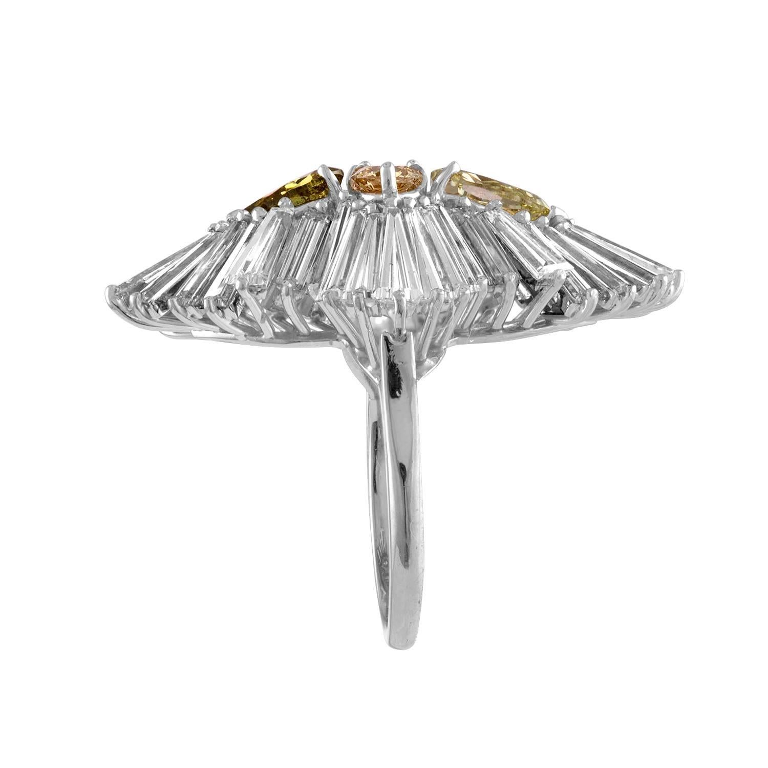 Contemporary White Gold Ring with Fancy Colors Diamonds and White Baguettes around It For Sale