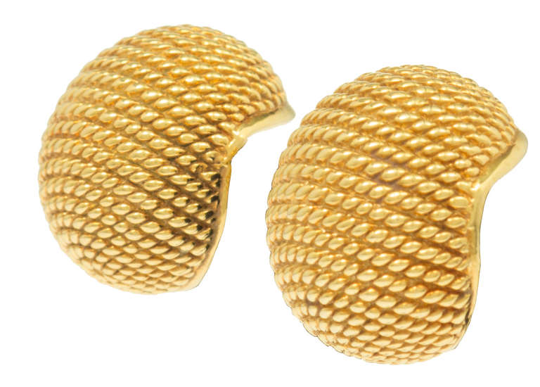 These domed shaped earrings  have a textured rope pattern, very nicely designed.