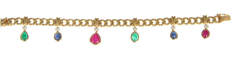 This is a beautiful and easy to wear bracelet. The stones have great color. Perfect for any time of year. 

The bracelet has 2 sapphires, 2 emeralds, 2 rubies and 6 diamonds.