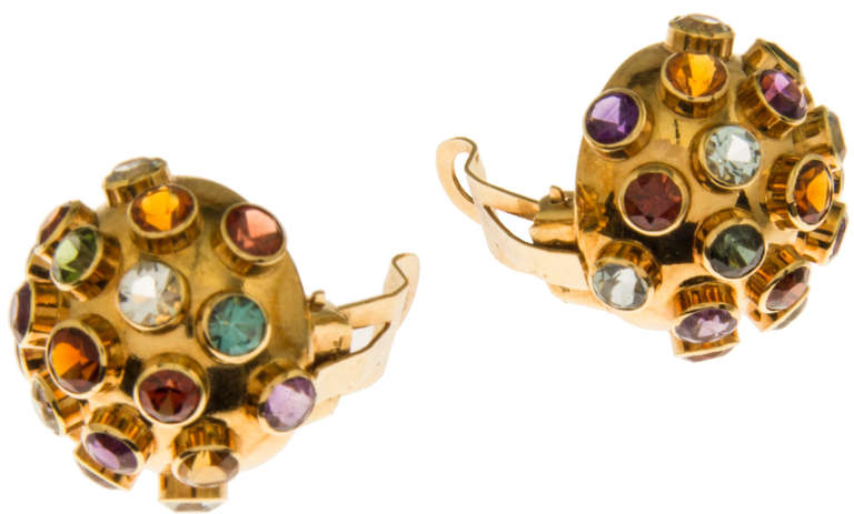 These iconic earrings were purchased in Rio from the H. Stern jewelry store.