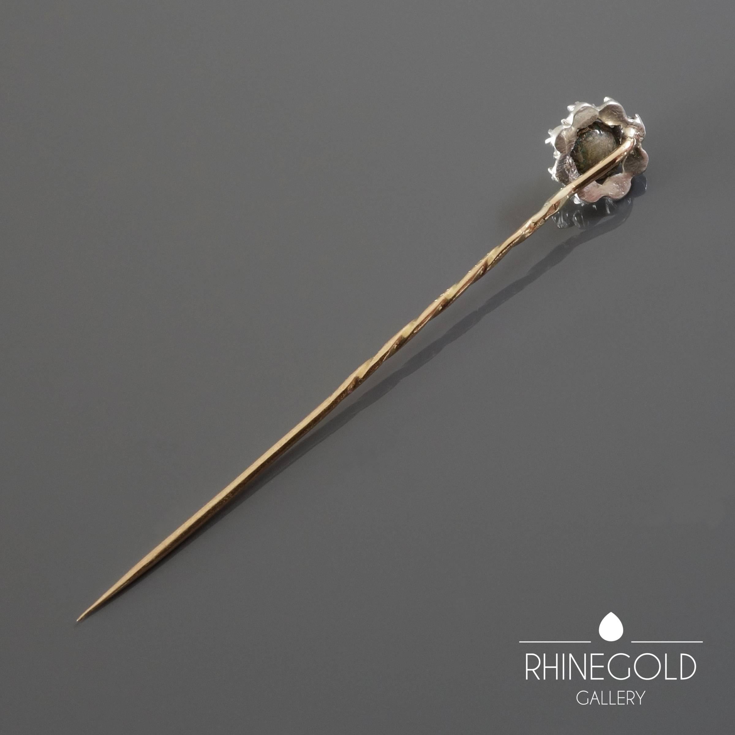 Antique Georgian Rose Cut Diamond Gold Silver Stick Pin
14K yellow gold, silver
Length 6.1 cm (approx. 2 3/8"), diameter of head 0.9 cm (approx. 3/8"), visible part of rose-cut diamond approx. 4.0 to 3.5 mm
Marks: none
Continental,