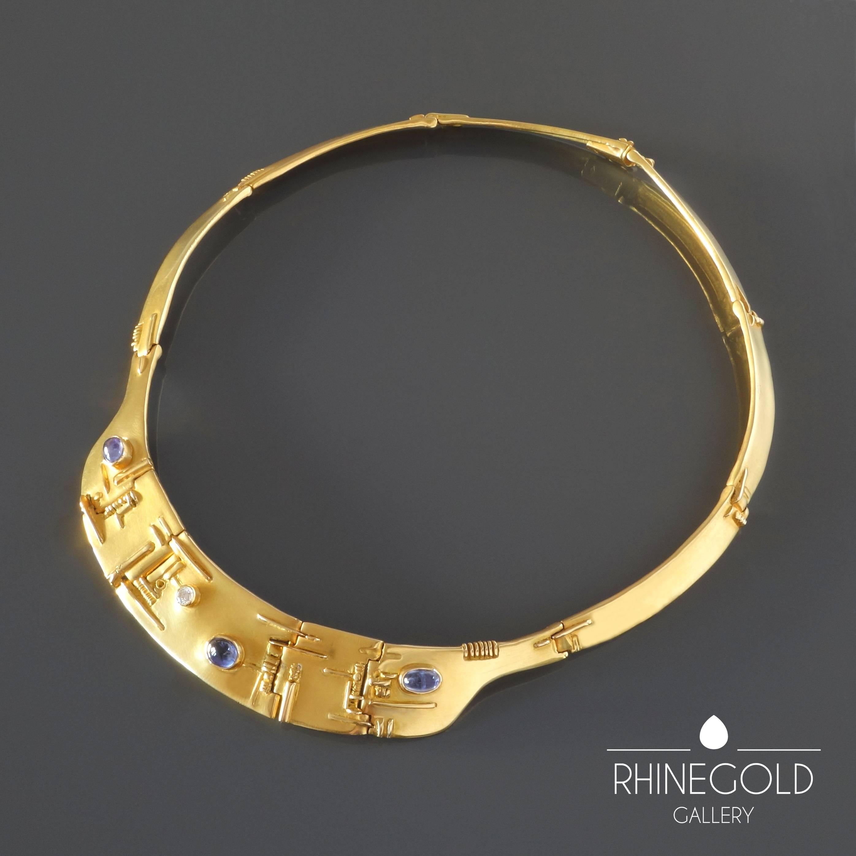 Fernand Demaret: Unique Modernist Diamond Sapphire Gold Necklace 
18k yellow gold, 1 brilliant cut diamond of approx. 0.1 carat, 3 lavender-blue sapphire cabochons
Length ca. 40 cm (approx. 15 3/4”), Width (front)  1.7 cm (approx.  11