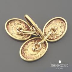 Pair of Art Nouveau Iris Flower Repoussé Gold Double Cufflinks, circa 1900