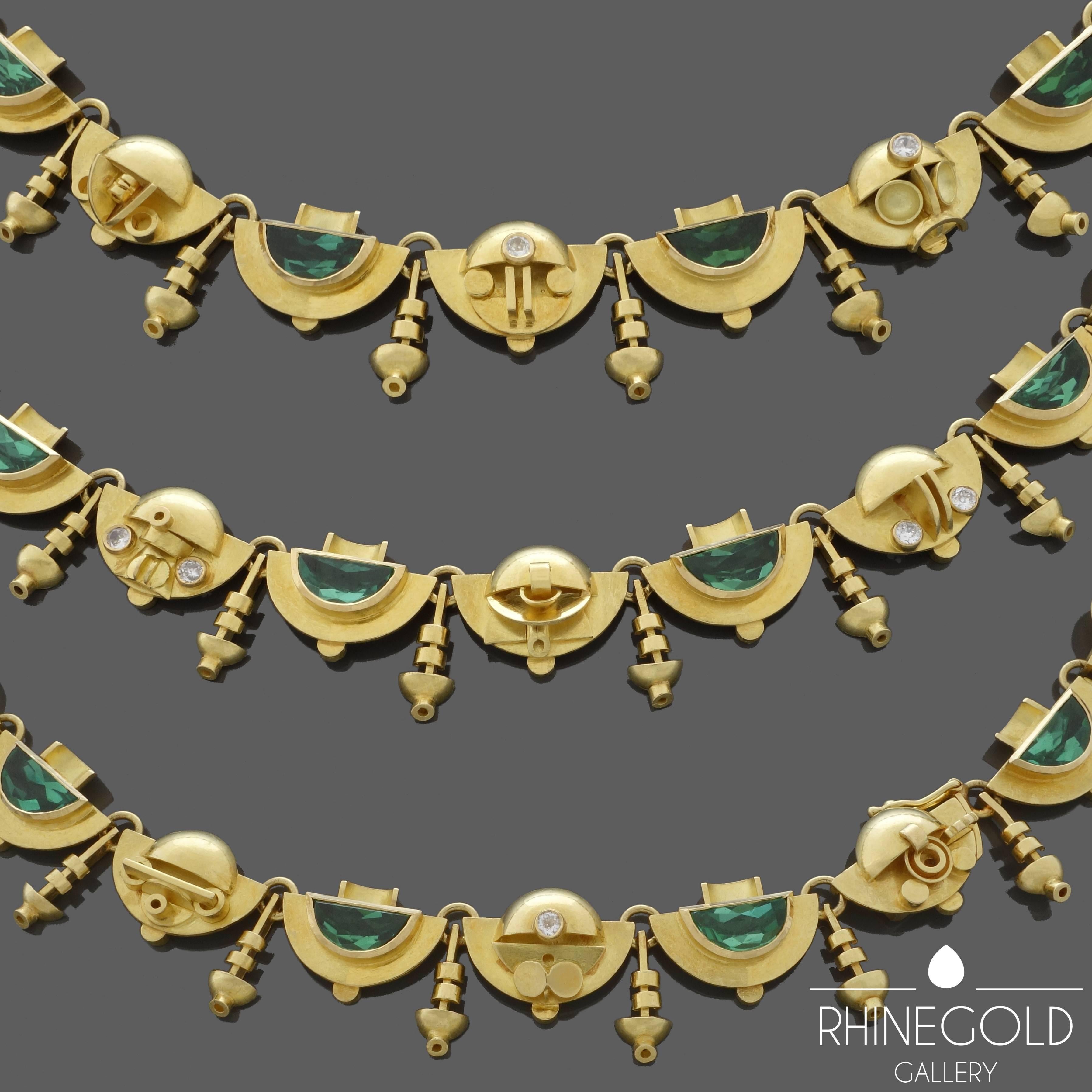 Ernst Treusch, Leipzig, Germany: Art Deco Tourmaline Diamond Gold Necklace
18k yellow gold, tourmaline (approx. 18 carats in total) , brilliant cut diamonds
Length 44.5 cm (approx. 17 15/16"), Width 1.5 cm (approx. 5/8")
Marks: Maker’s