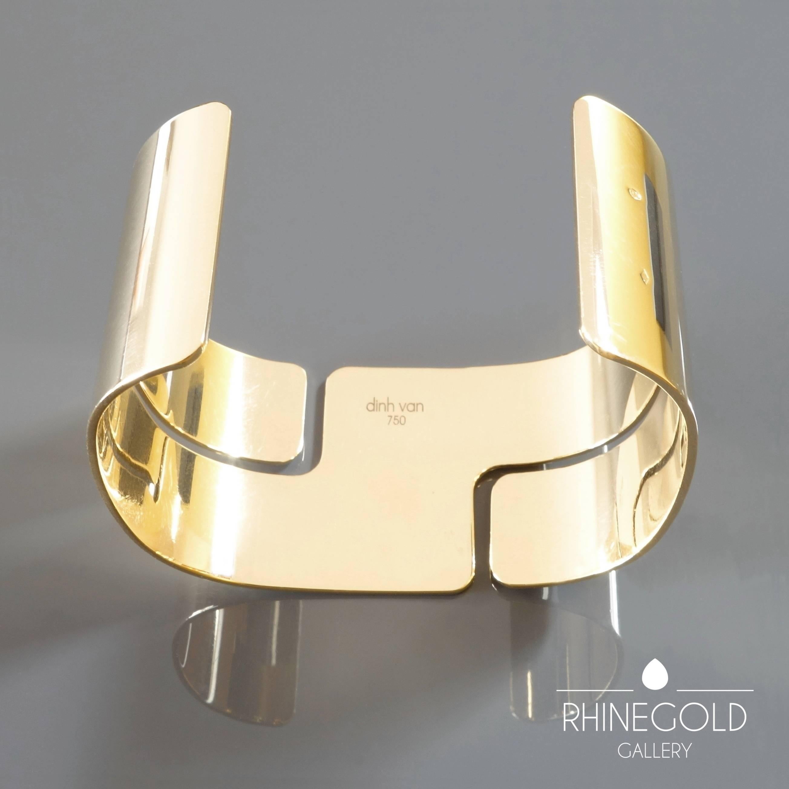 Dinh Van Modern Retro ‘Seventies’ Gold Cuff Bangle
18k yellow gold
Width 2.9 cm (approx. 1 1/8"), inner circumference (incl. gap) approx. 16 cm (6 5/16")
Weight 55.7 g
Marks: ‘dinh van 750’, French eagle mark for 18k gold, lozenge shaped