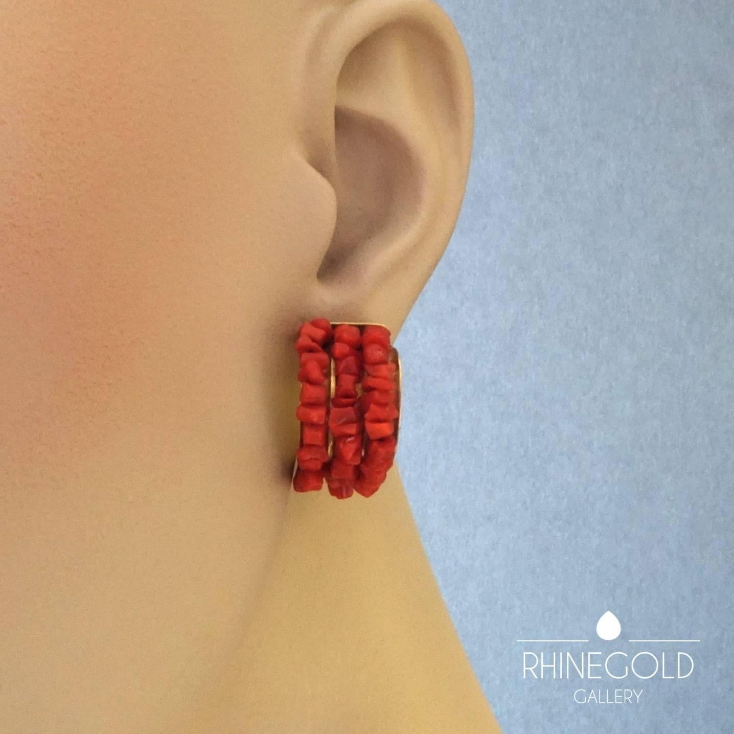 Sabine Strobel Natural Coral Gold Half Hoop Clip-on Earrings
18k yellow gold, natural coral
Height 2.3 cm, width 1.3 cm (approx. 7/8” by 1/2”), depth 1.5 cm (approx. 5/8”)
Weight approx. 10.7 grams
Marks: gold content mark ‘750’ for 18k gold;