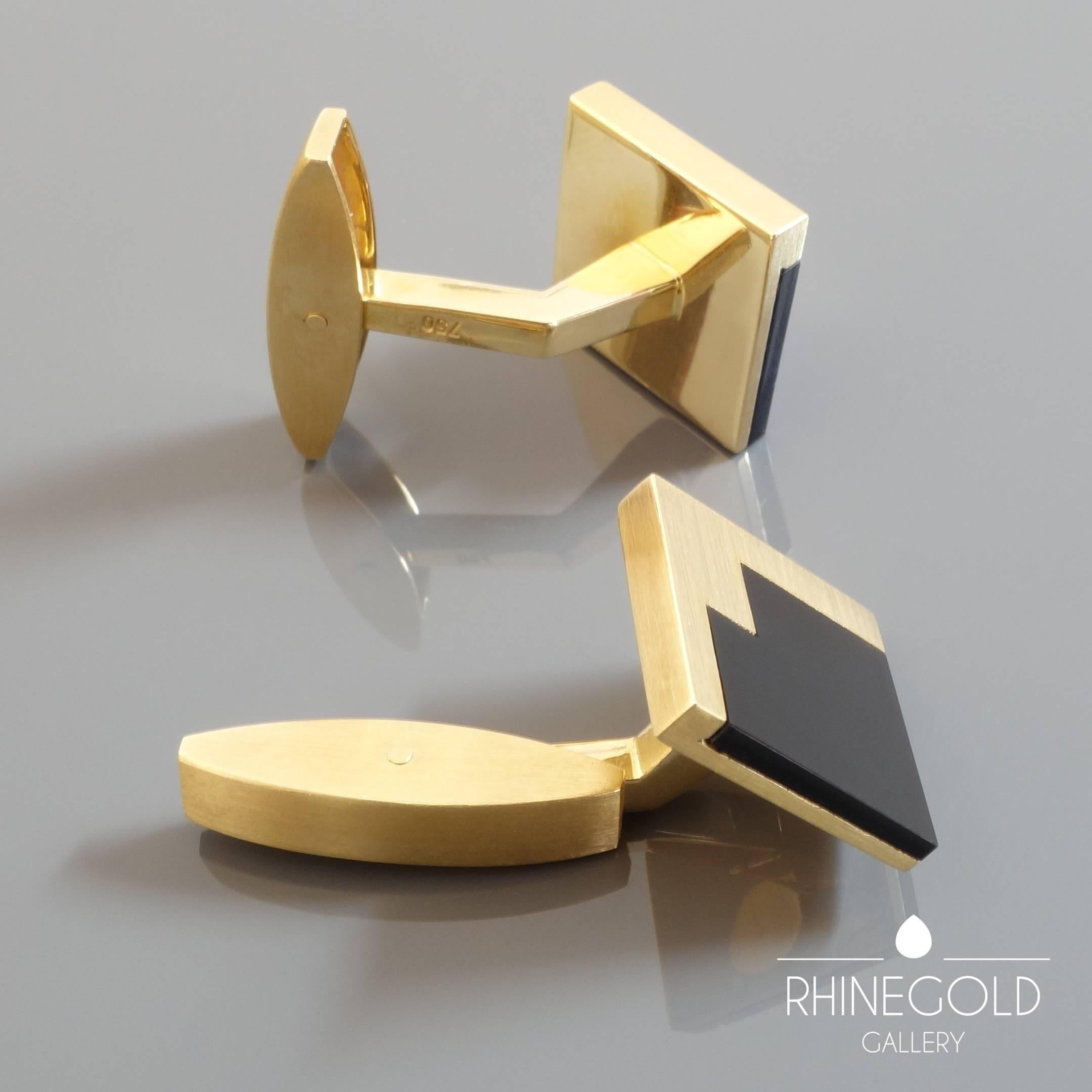 Emil Krauss Post-Modernist Onyx Gold Cufflinks
18k yellow gold, onyx
Fronts 1.5cm by 1.5 cm (approx. 5/8” by 5/8”) 
Weight approx. 20.7 grams
Marks: maker’s mark; gold content mark ‘750’ for 18k gold
Germany, 1980s – 1990s

Solidly worked from 18k