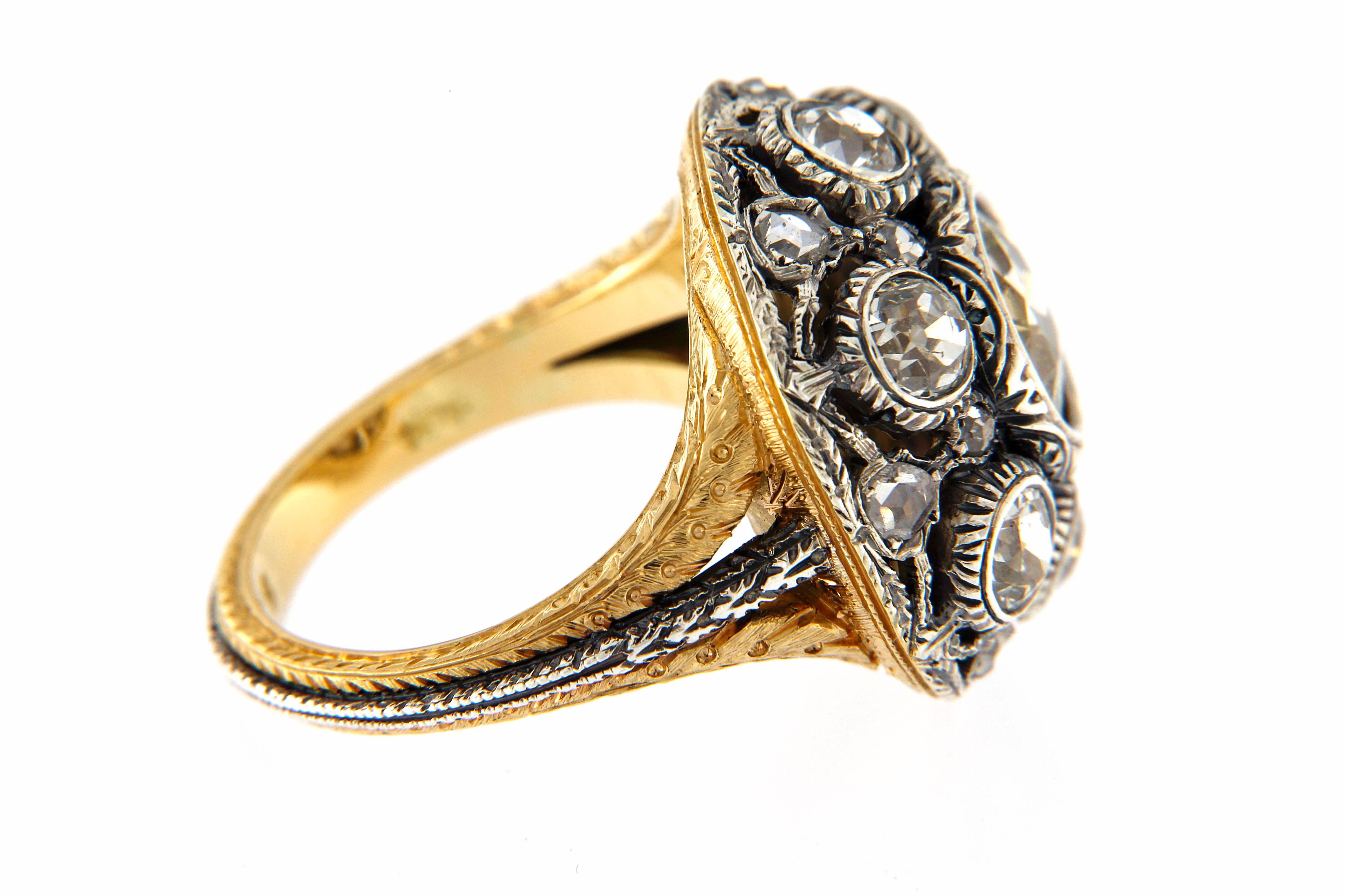 Beautiful unique piece Mario Buccellati Ring, made in 1940s circa in gold 18 kt and sterling silver.
diamonds setting is made in silver . Very good conditions
Size US 7 1/2 
central mine cut diamond ct. 2.10 circa
others mine cut , total weight