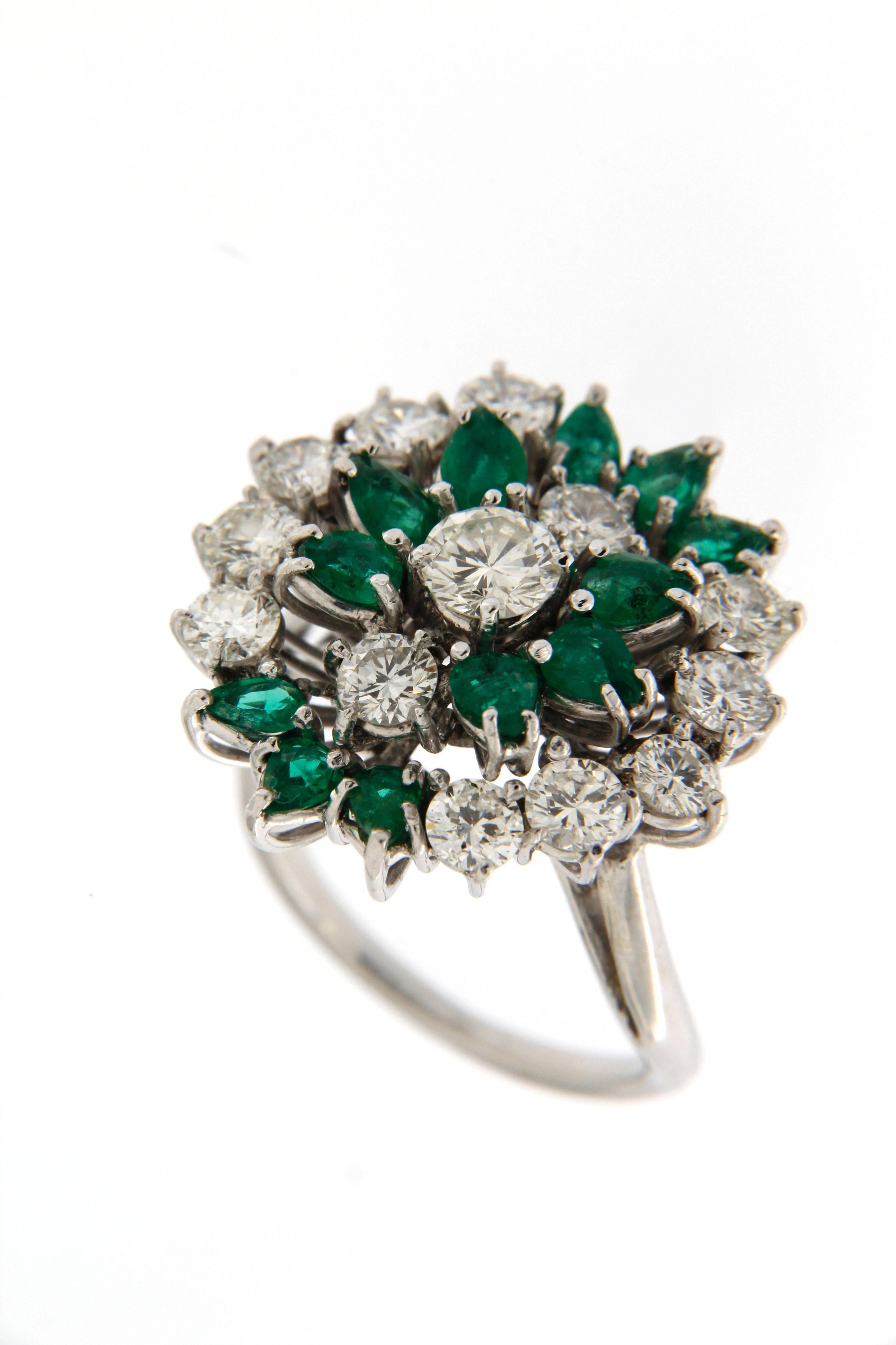 Original Italian jewelry dated 1960, with beautifull Columbia Emeralds
central diamond ct. 0,40
total weight other diamonds ct. 1.20
Columbia Emeralds total weight ct. 1.50
Size of the ring 13.5 - French size 53.50
the ring can be sized before