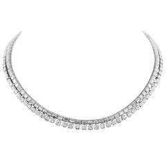 Retro 30 Carat Brilliant and Baguette Diamond Platinum Riviere Necklace