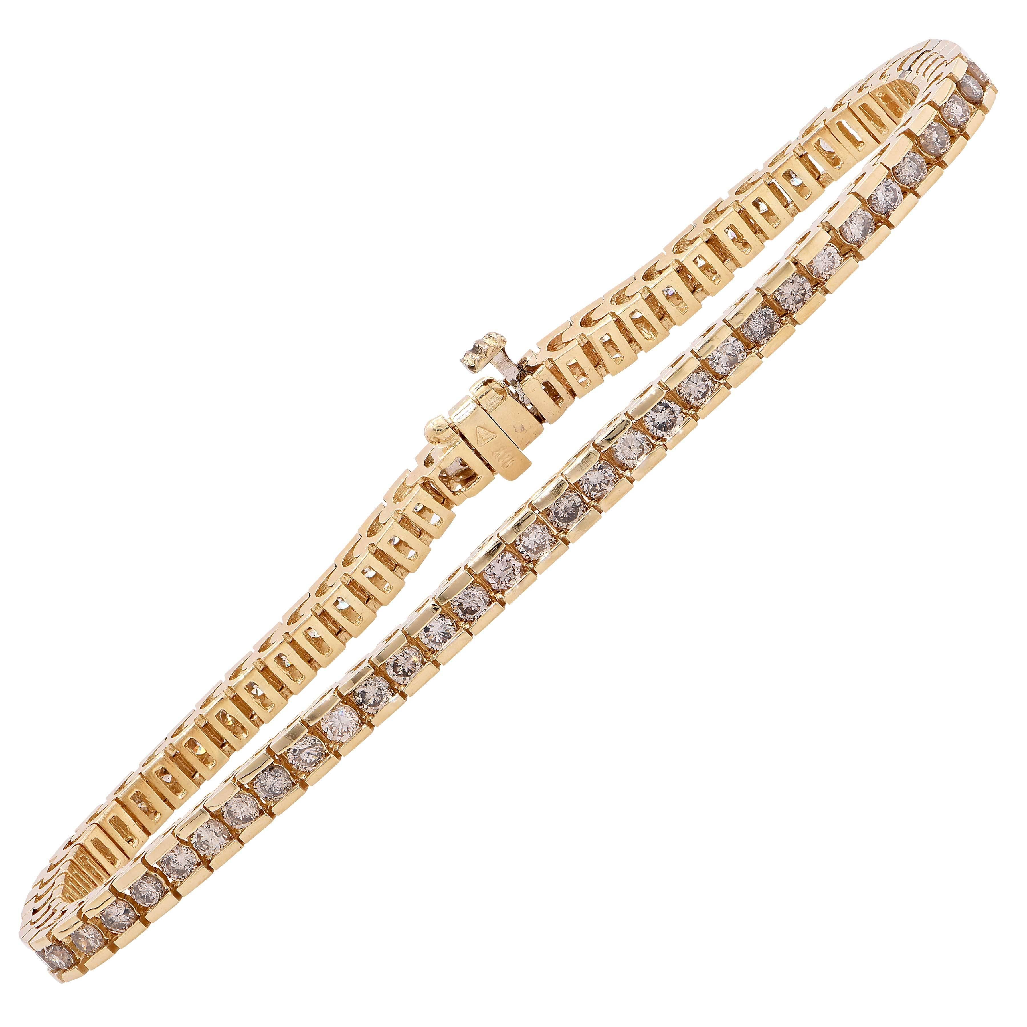 2.8 Carat Cognac Diamond Yellow Gold Channel Set Tennis Bracelet For Sale