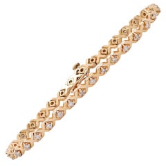 Bracelet tennis en or avec diamants en forme de Xs et d'os de 1,3 carat